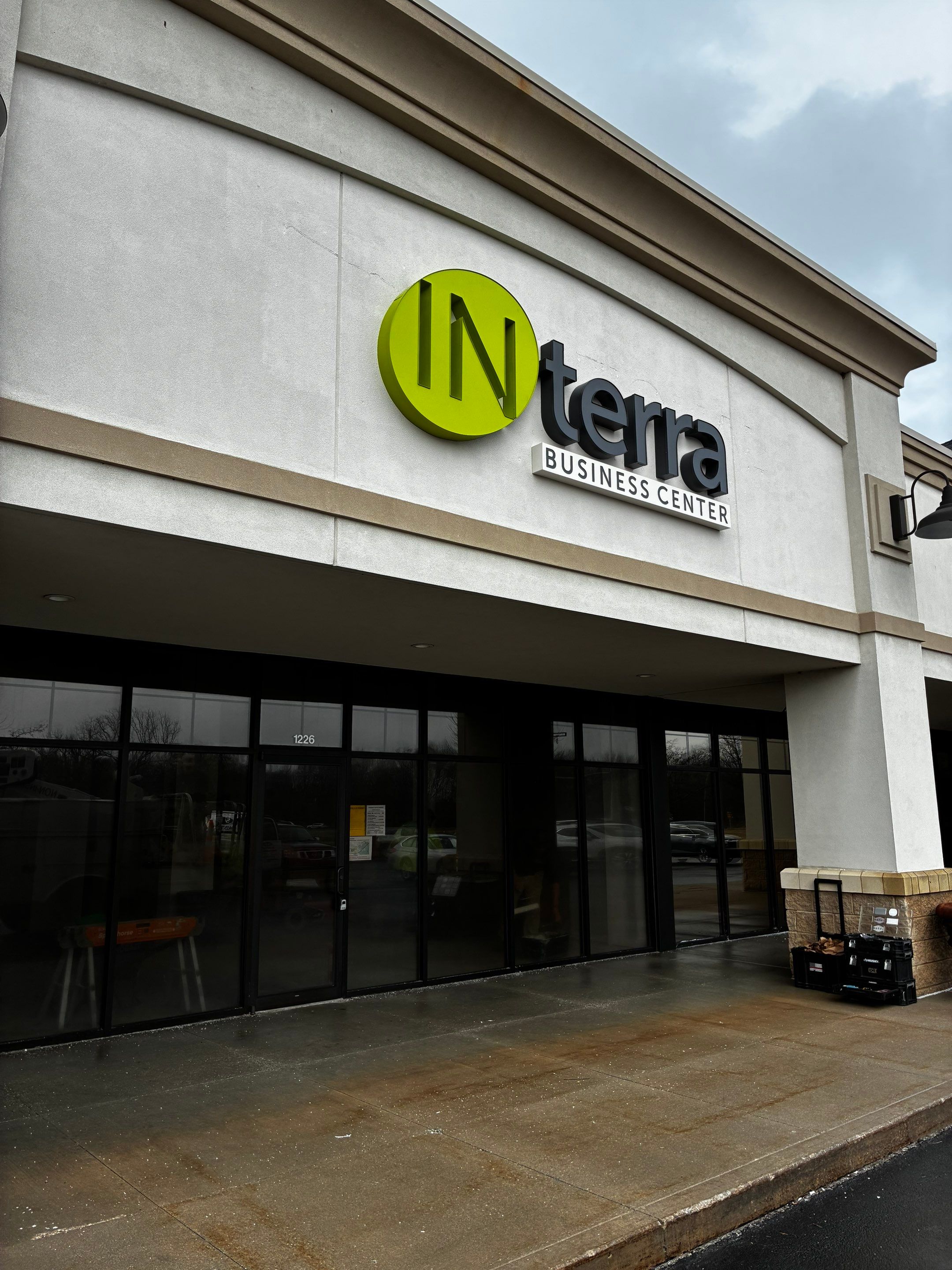 Building Signage Installation for INterra Business Center in Granger by Hayes Design co