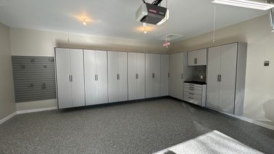 Macy T. transformed her garage with our beautiful cabinets 
