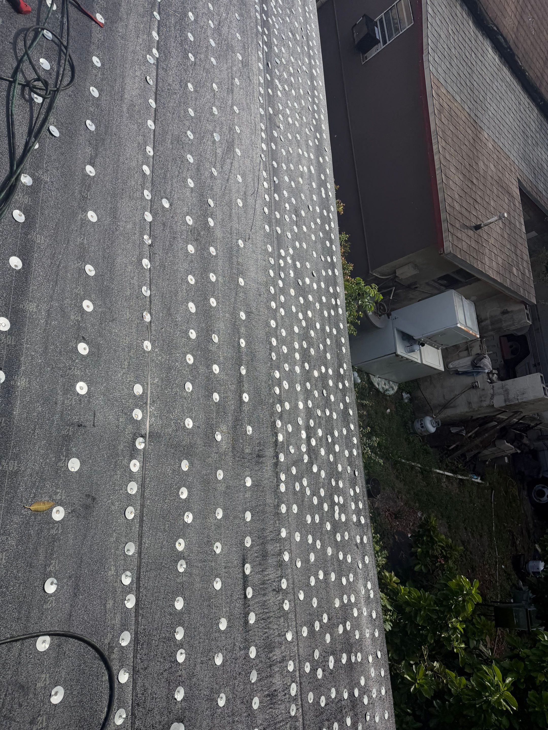 Residential Roofing System Replacement and Deck Repair in Northwest Neighborhood by Picos Construction Engineering