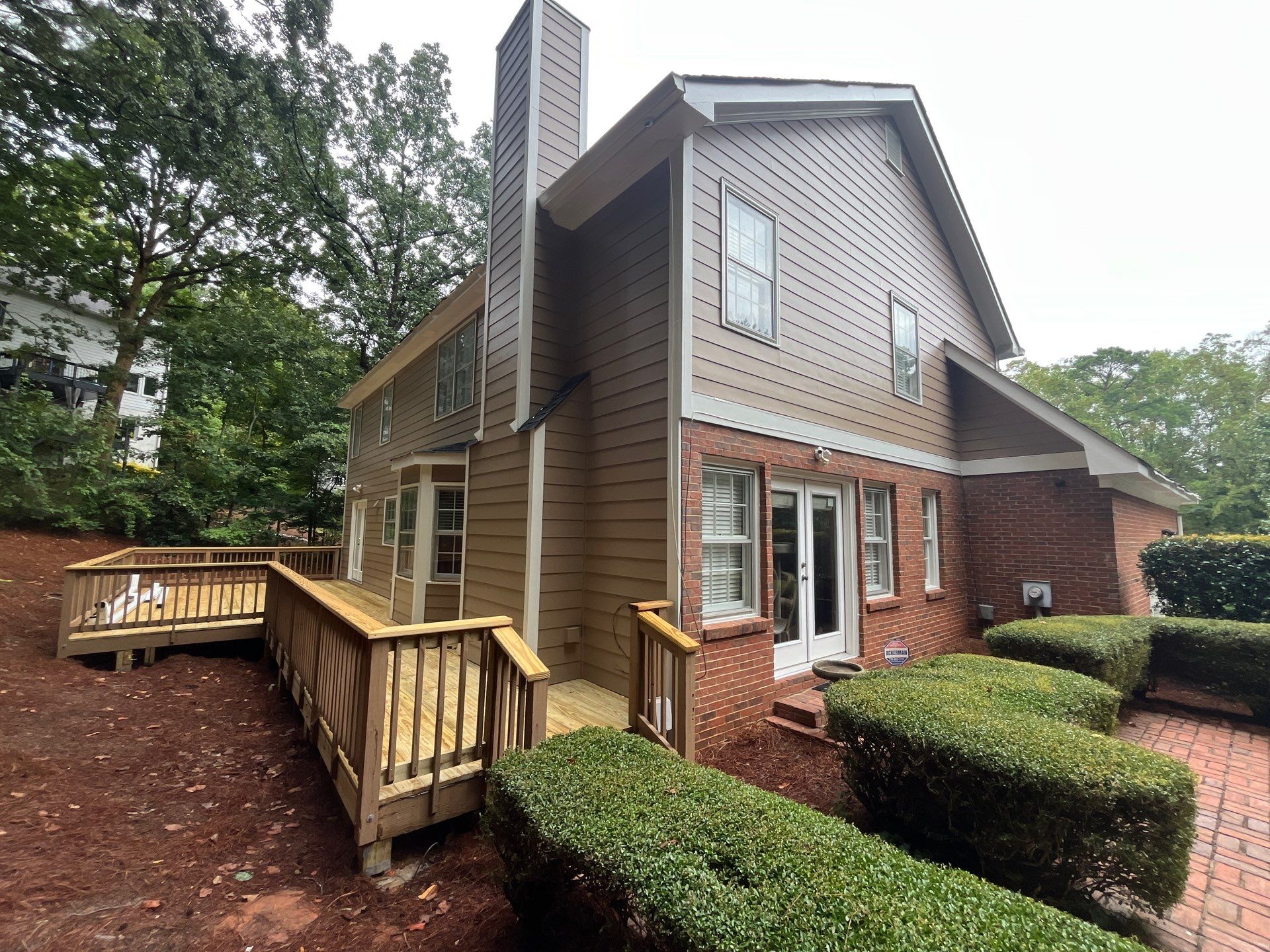 James Hardie Siding Installation, Rotten Wood Replacement, Porch Repairs, and Deck Resurfacing in Smyrna, GA by Nelson Exteriors 