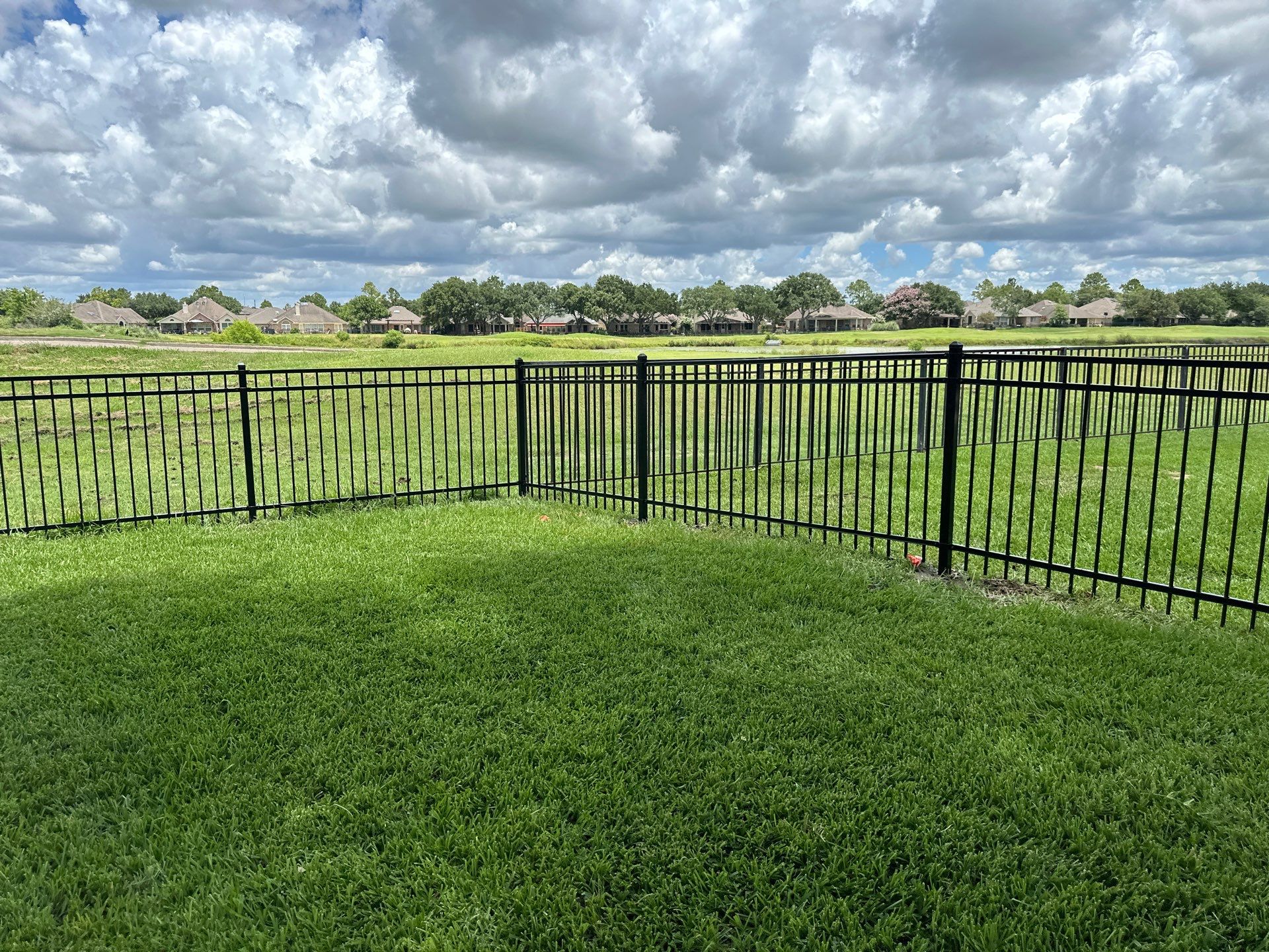Stunning iron installation in Pearland by Tim's Fences