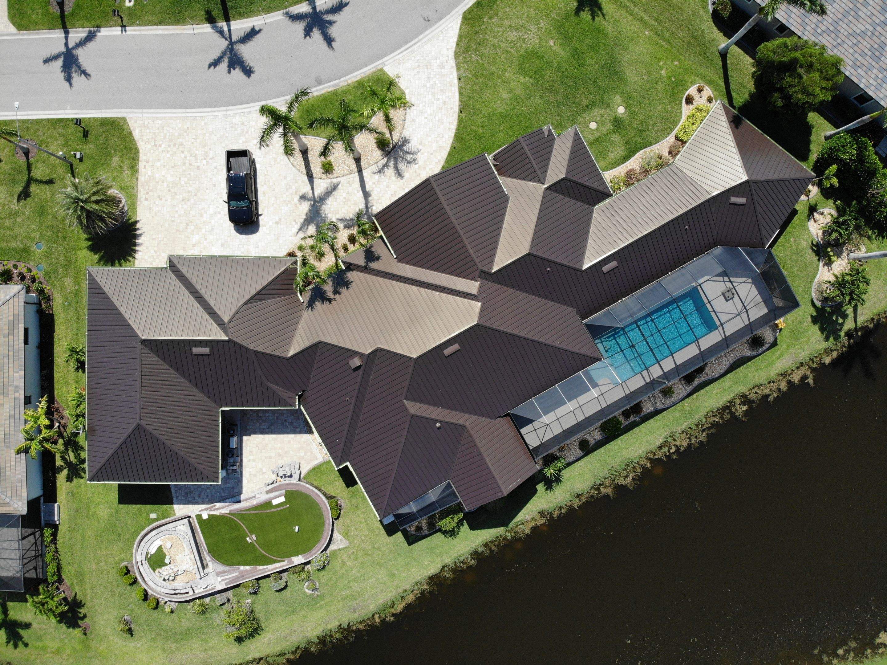 Residential Roofing Installation using Standing Seam Metal Roof in Cape Coral, FL by International Roofing