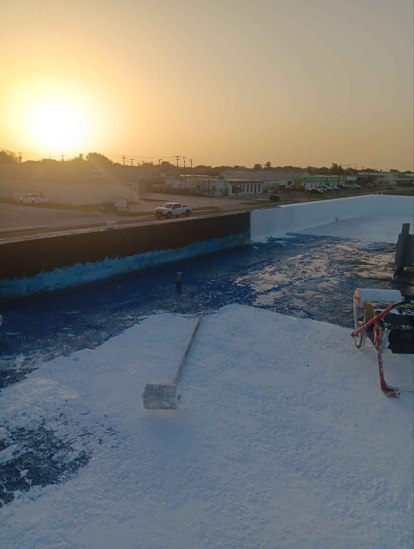 Dirty leaking Gravel Roof by Bayfront Roofing and Construction