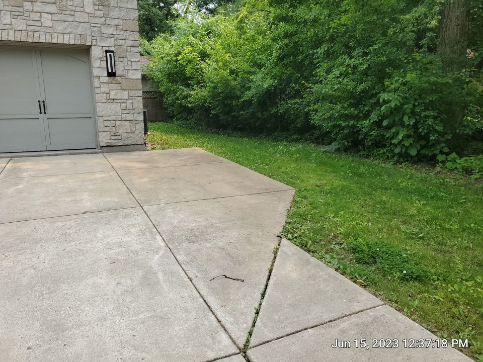 Highland Park, IL Bluestone, concrete,  Trex deck cleaning by Northern Power Washing LLC.