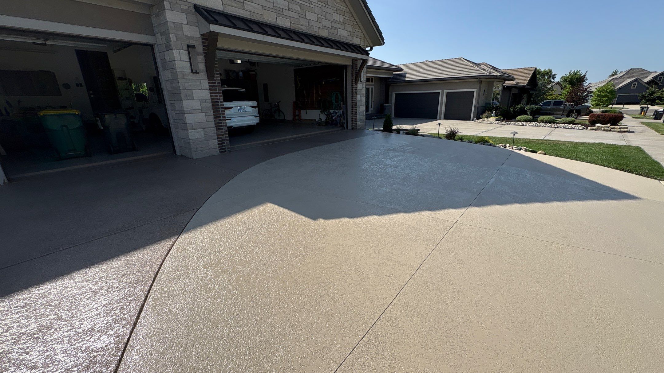 Two-Tone Driveway Resurface - Olathe, KS by Big Red Decorative Concrete, LLC