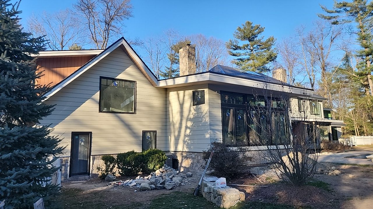 Siding in Weston,  MA by UBrothers Construction