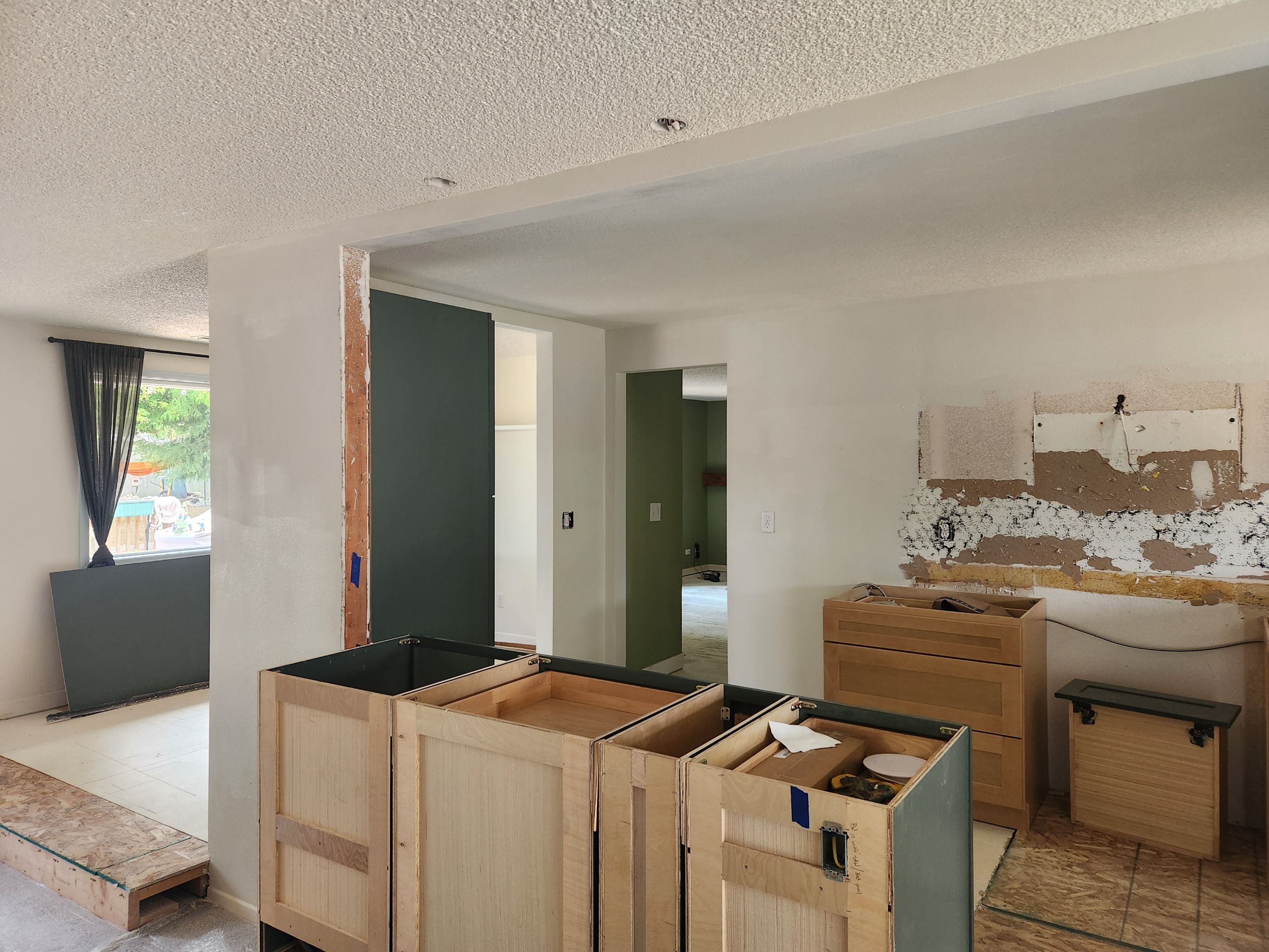 Vancouver Kitchen Renovation Featuring Tile Backsplash and Farmhouse Sink by American Made Construction 