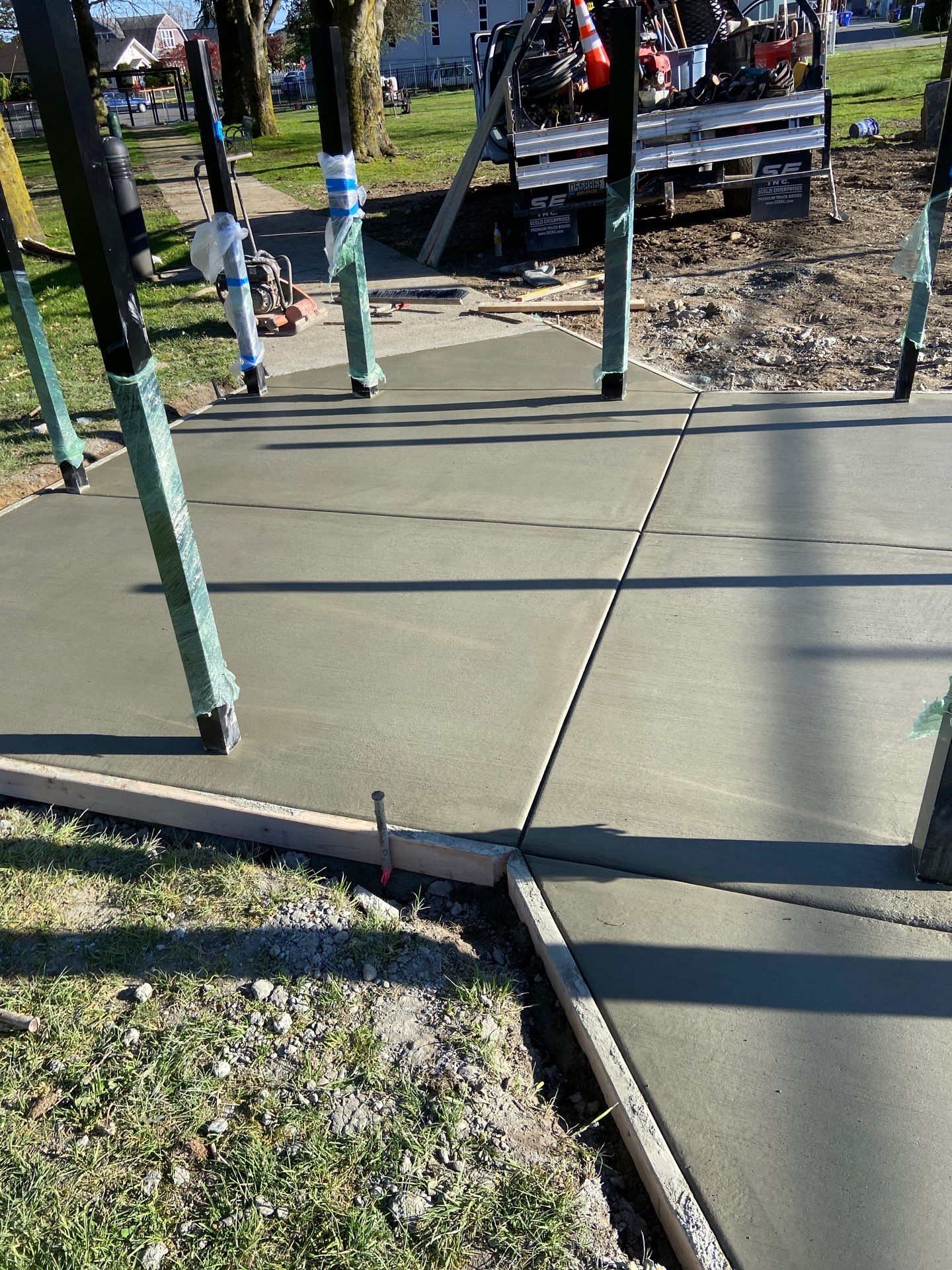 Concrete Patch Repair with Bollards | Clark Dog Park - Everett  by Jireh Asphalt & Concrete Inc 