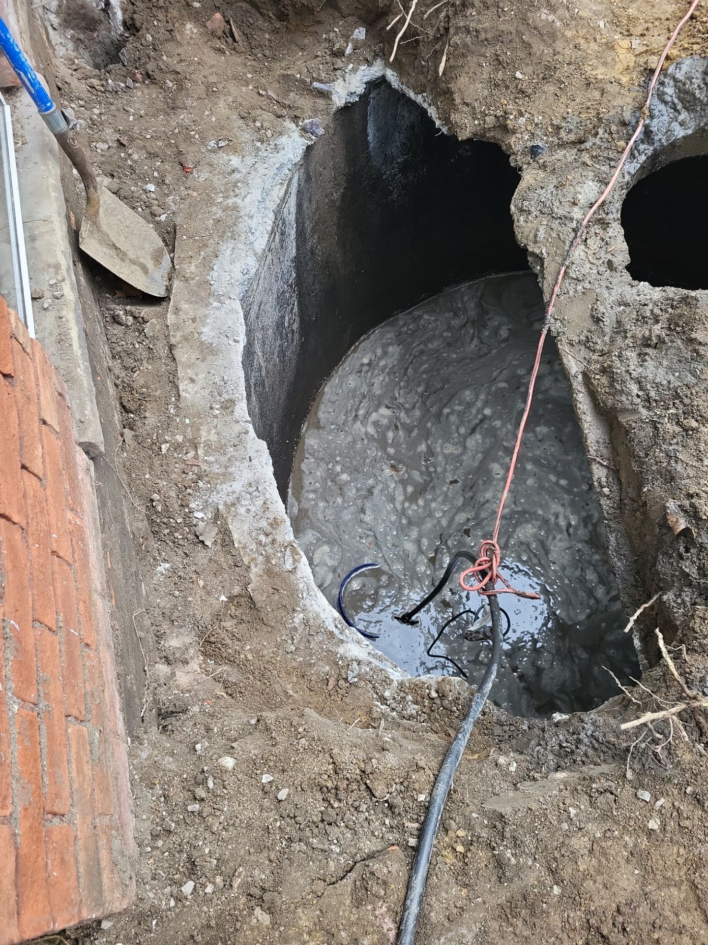 Exterior Basement Waterproofing & Combo Sump Backup System by Toledo Basement Repair