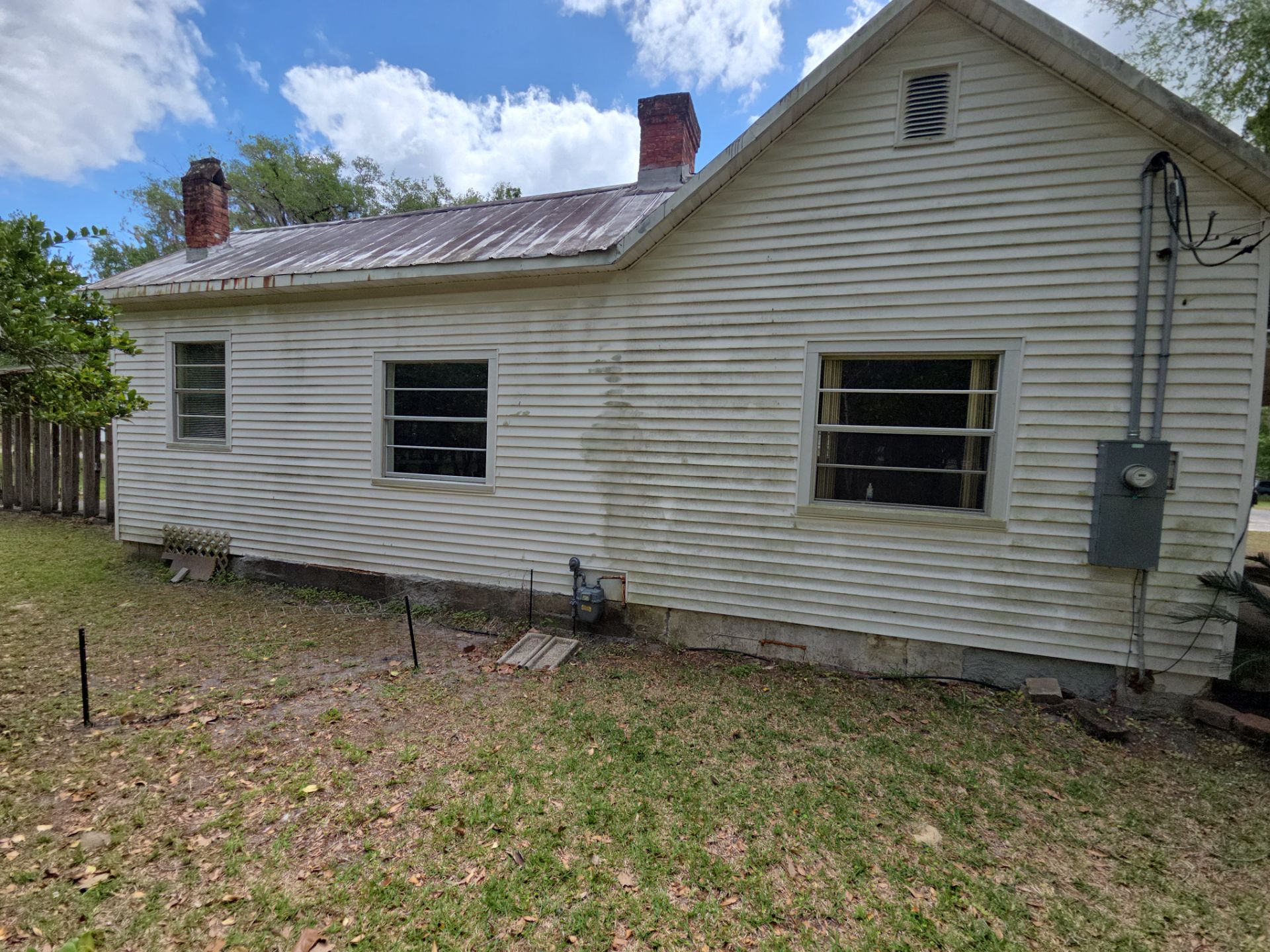 White Vinyl Window Replacement for Residential Home in Williston by Windows & Doors Store