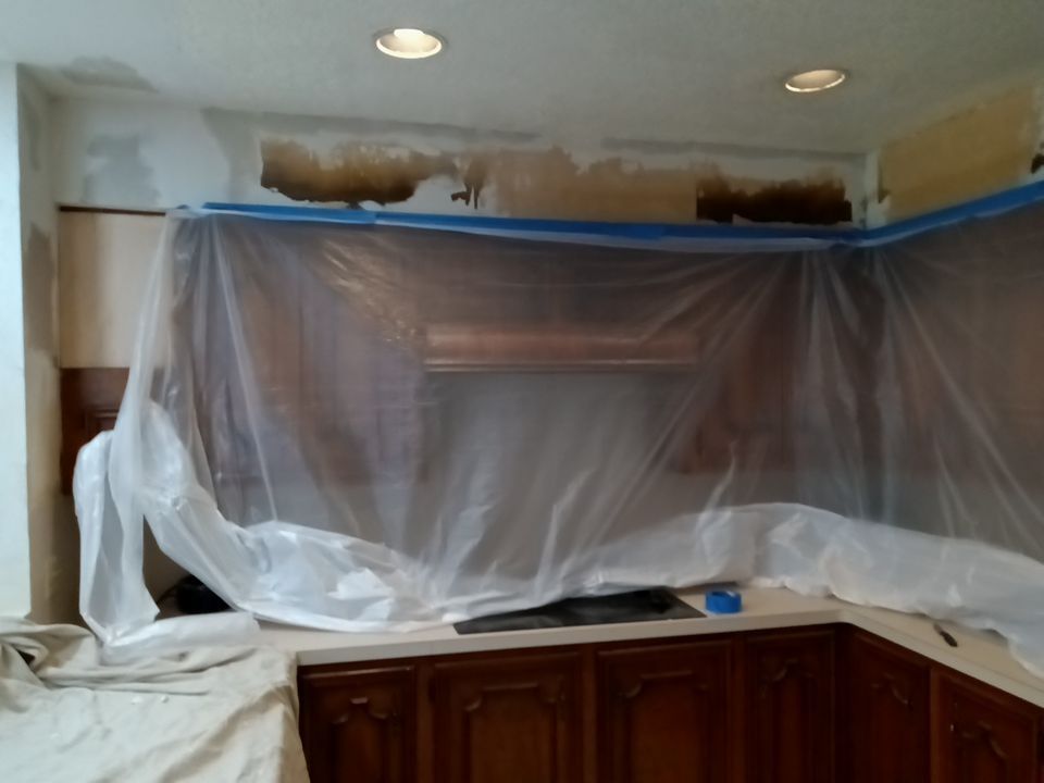 Interior and exterior painting project by Roof Concepts Construction