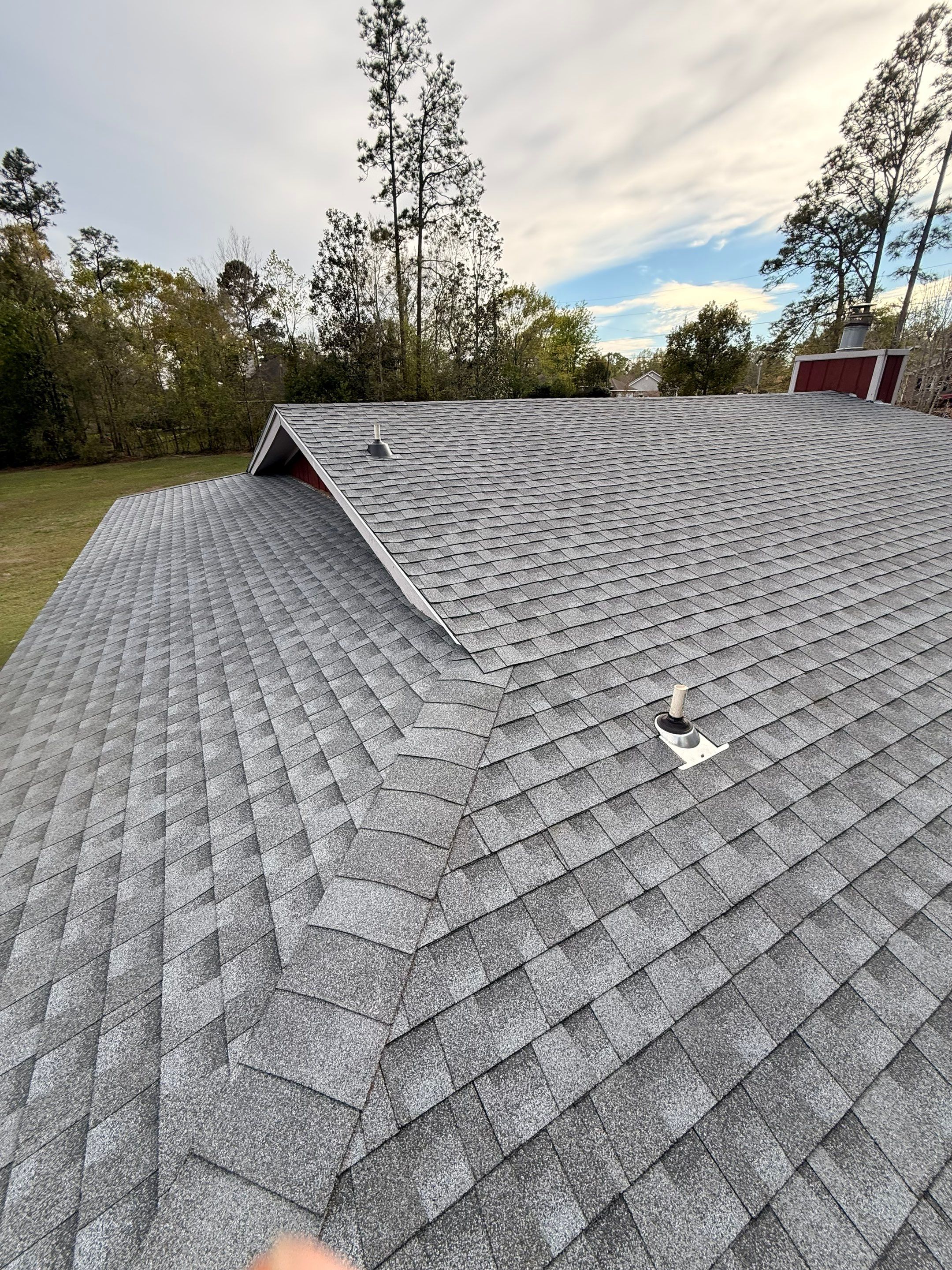 Full Asphalt Shingle Roof Replacement and Decking Repair in Carriere by Frontline Roofing