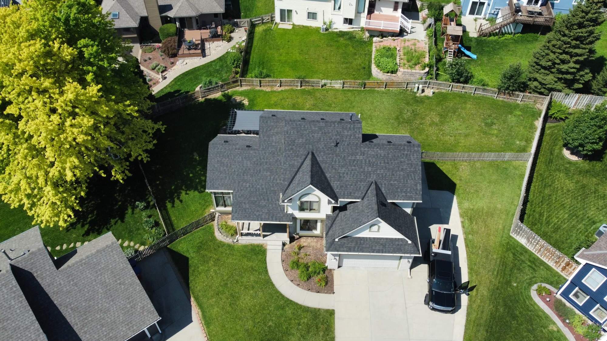 Residential Roofing Installation using IKO Nordic Glacier Impact Resistant Class 4 by Lightning Exteriors