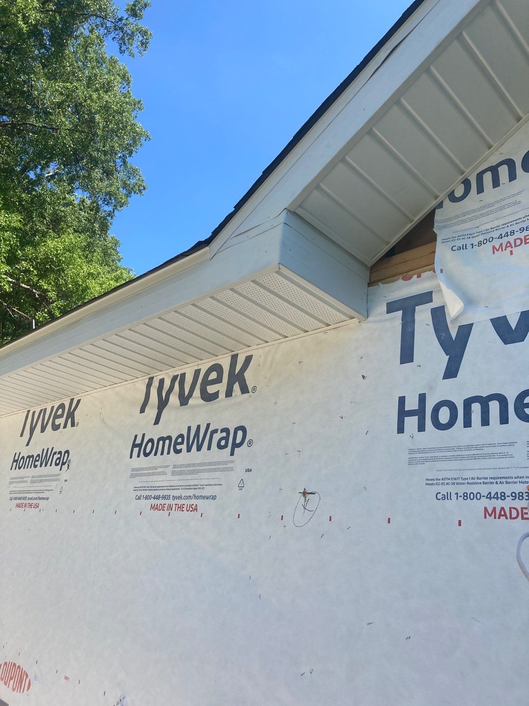 Gutter Installation using 5" Seamless Aluminum Gutters by Absolute Roofing and Construction