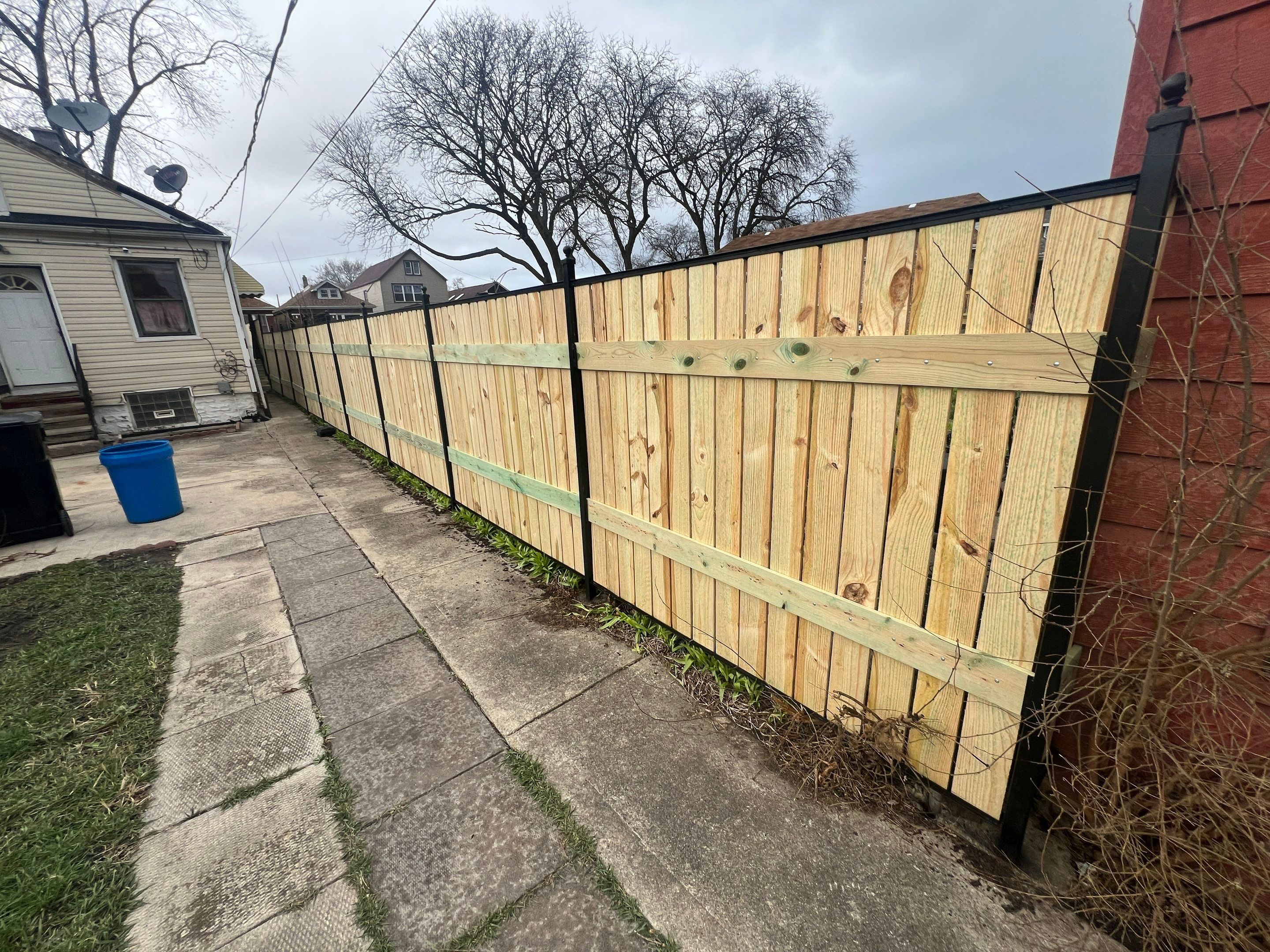Fence Installation using pressure treated lumber  by INQUSE GENERAL CONTRACTOR
