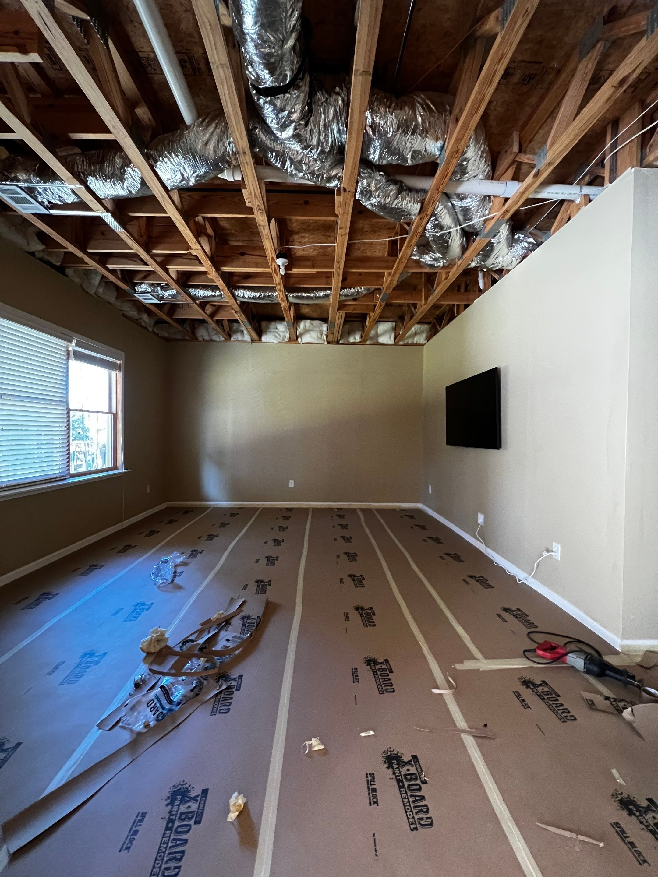 Finished Basement Renovation Featuring Polished Concrete in Atlanta by Swift Home Renovations