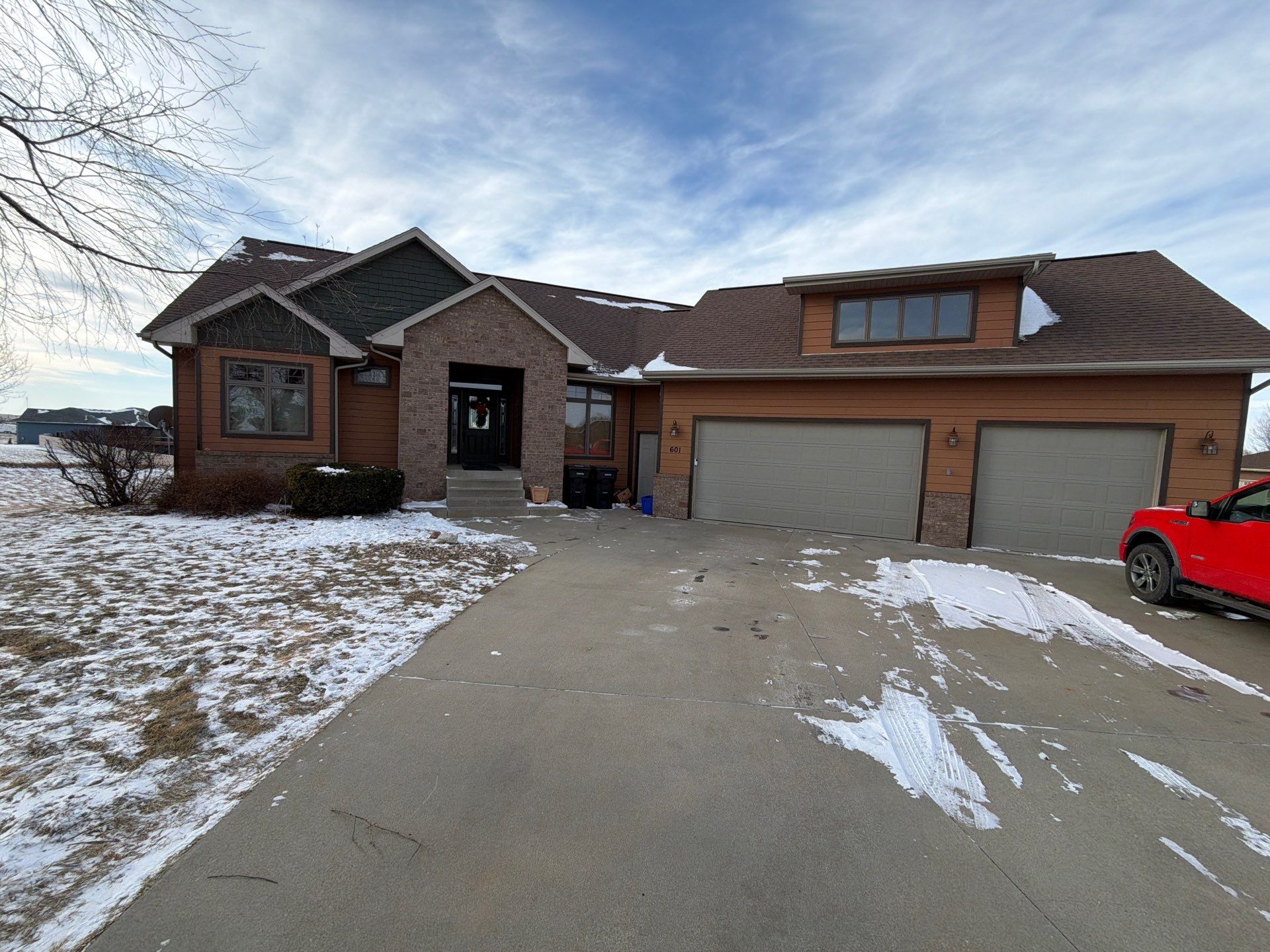Residential Exterior Painting and Siding Restoration in Crooks by Select Painting, Coatings & Garage Cabinets