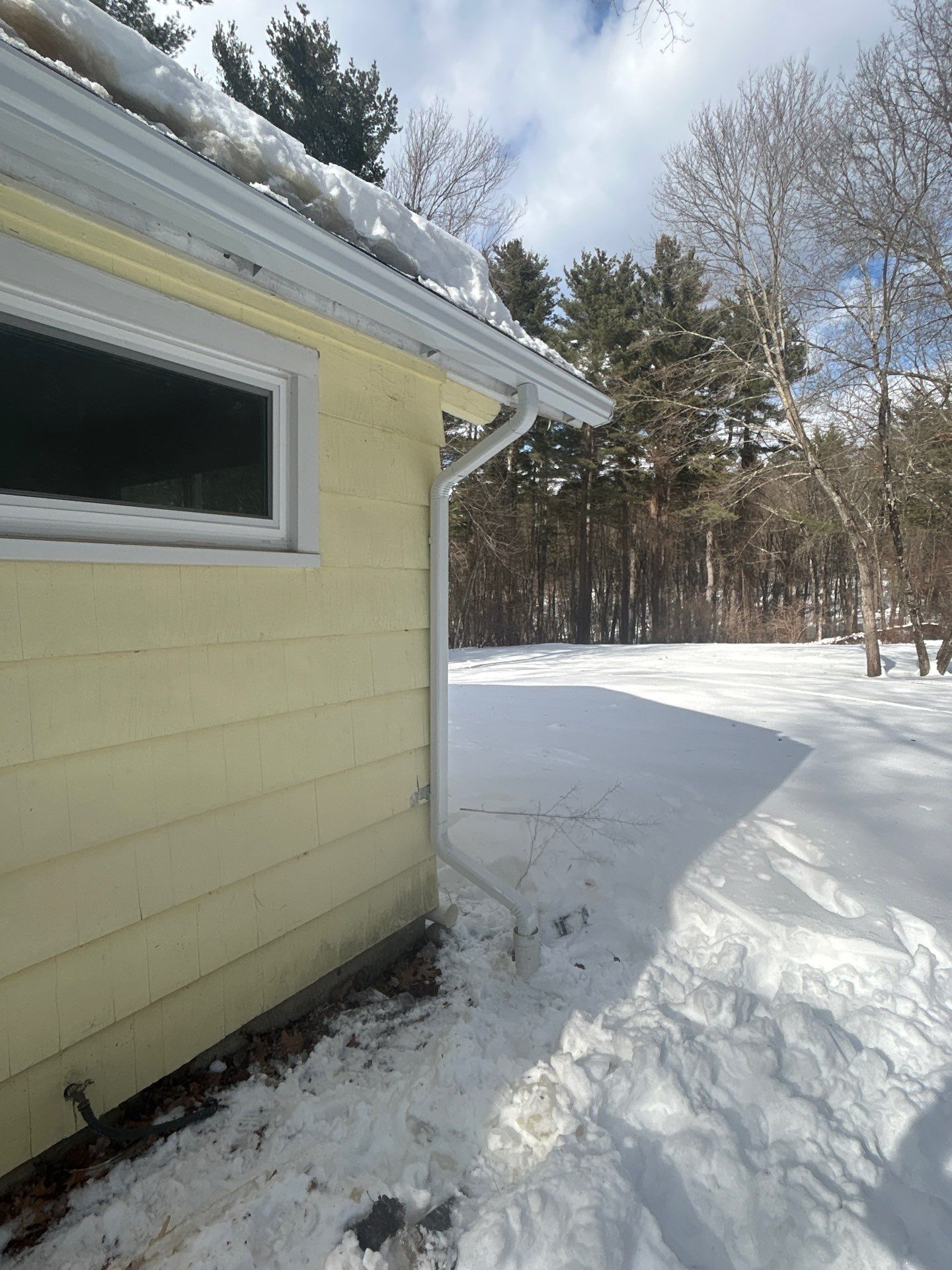 Gutter Installation Project in Stow by Mighty Dog Roofing of Greater Middlesex County