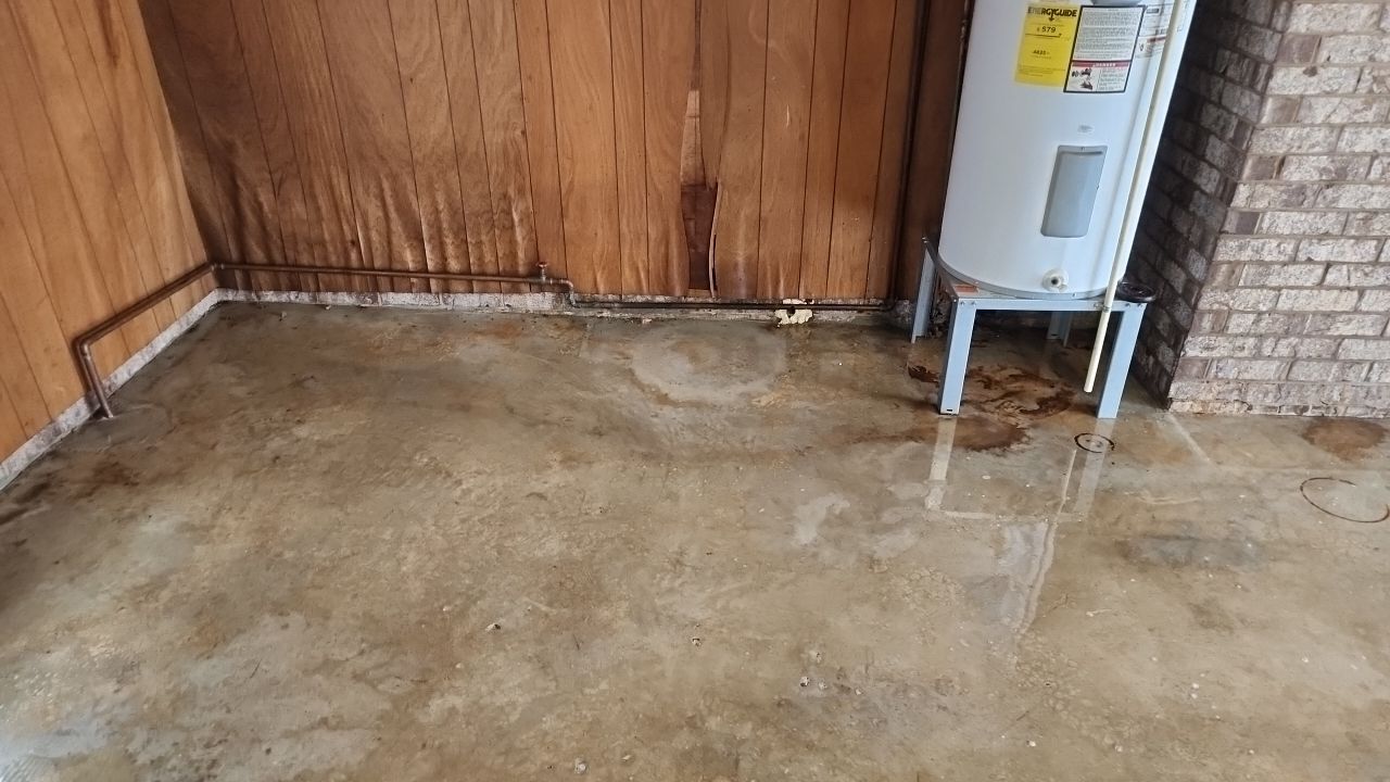 garage floor clean using cleaner by G&H Home Tech Pros LLC
