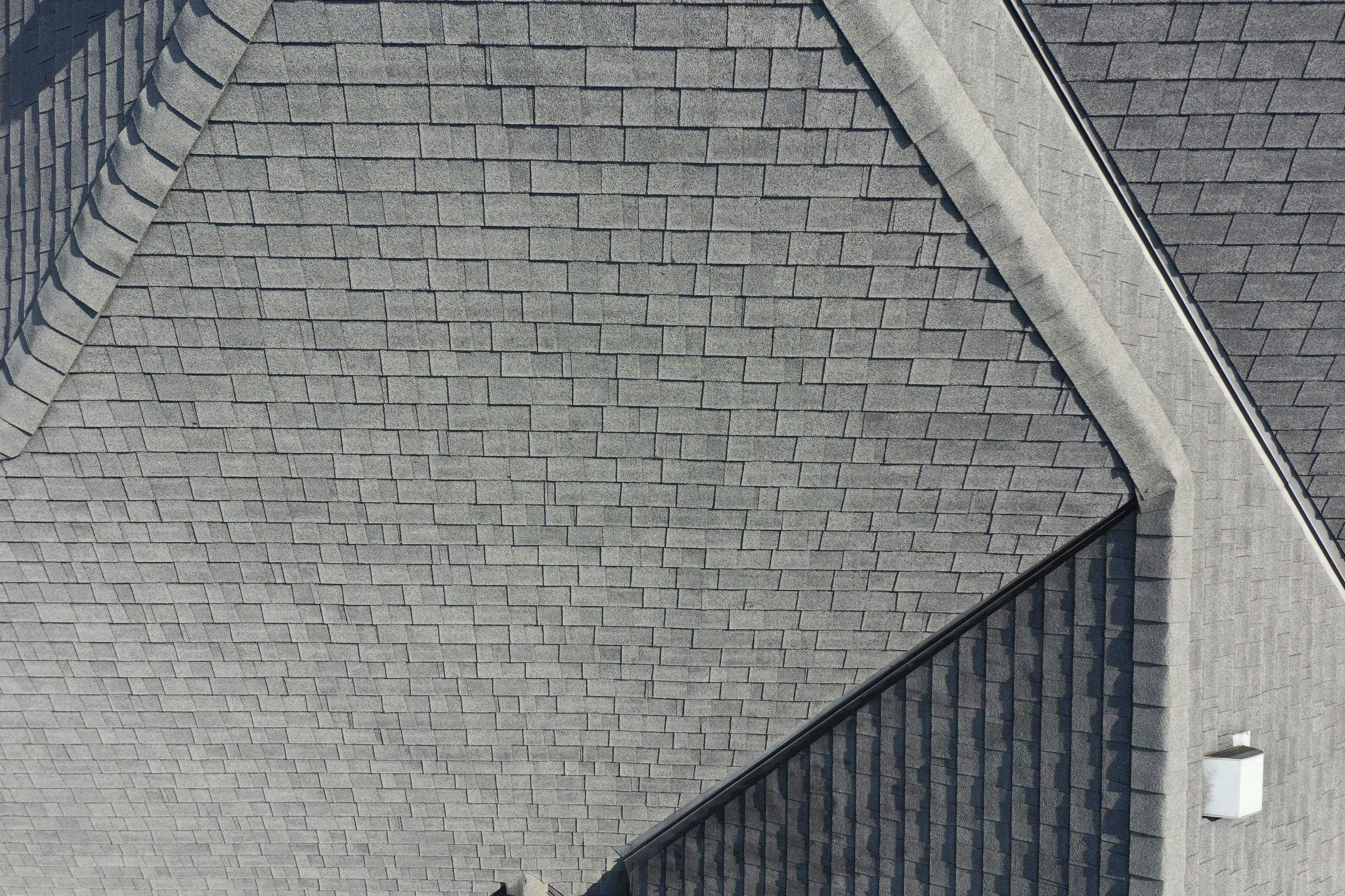 Residential Roofing Installation using Certainteed Landmark Moire Black by MODERN EXTERIOR SYSTEMS