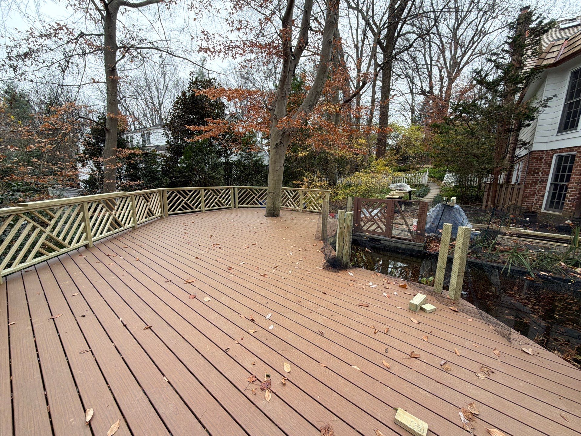 Custom Composite Deck Replacement with Geometric Railing in Bethesda, MD by Jakari Restoration & Construction LLC