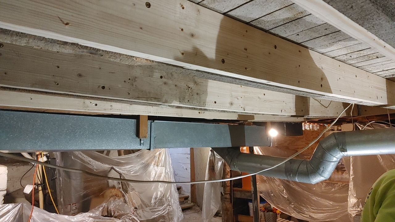 Structural Wood Reinforcement using Structural Wood and Steel Reinforcements (Main Floor Joist) by Toledo Basement Repair