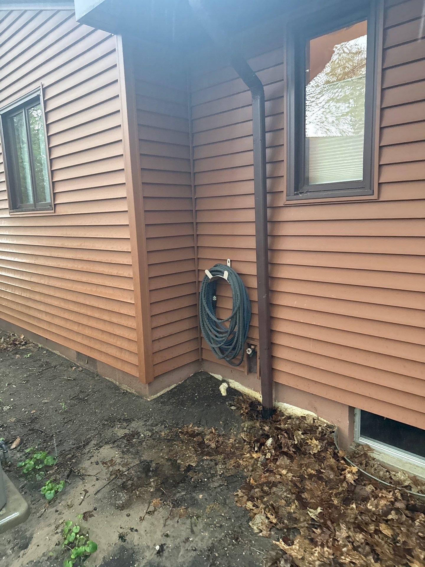 Gutter Protection and Downspout Drainage Installation in Traverse City by Rainbow Seamless Systems
