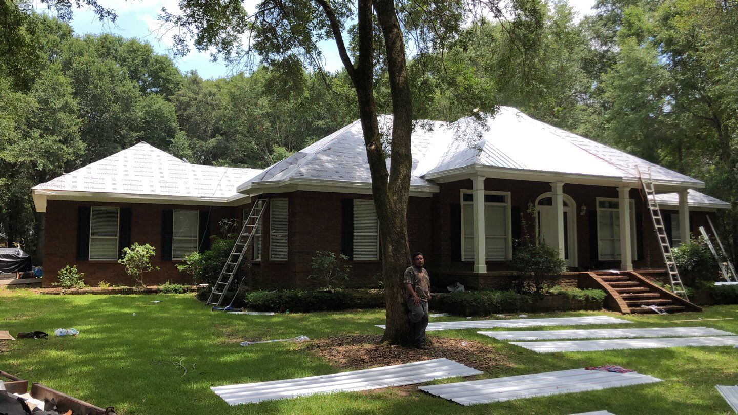 Residential Roofing Installation using Metal roofing by American Roofing & Construction LLC