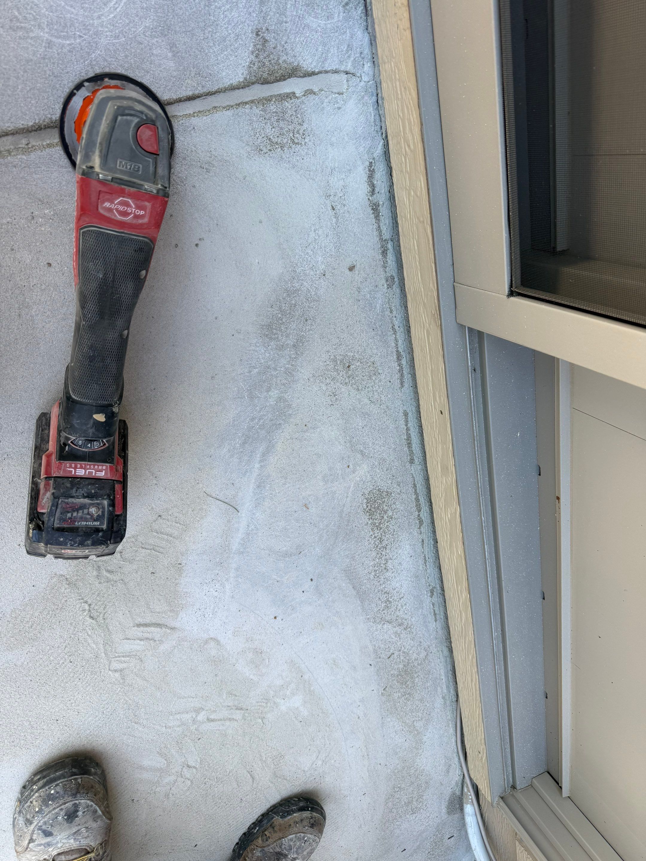 Textured Concrete Coating and Paver Patio Refresh in Sioux Falls by Select Painting, Coatings & Garage Cabinets