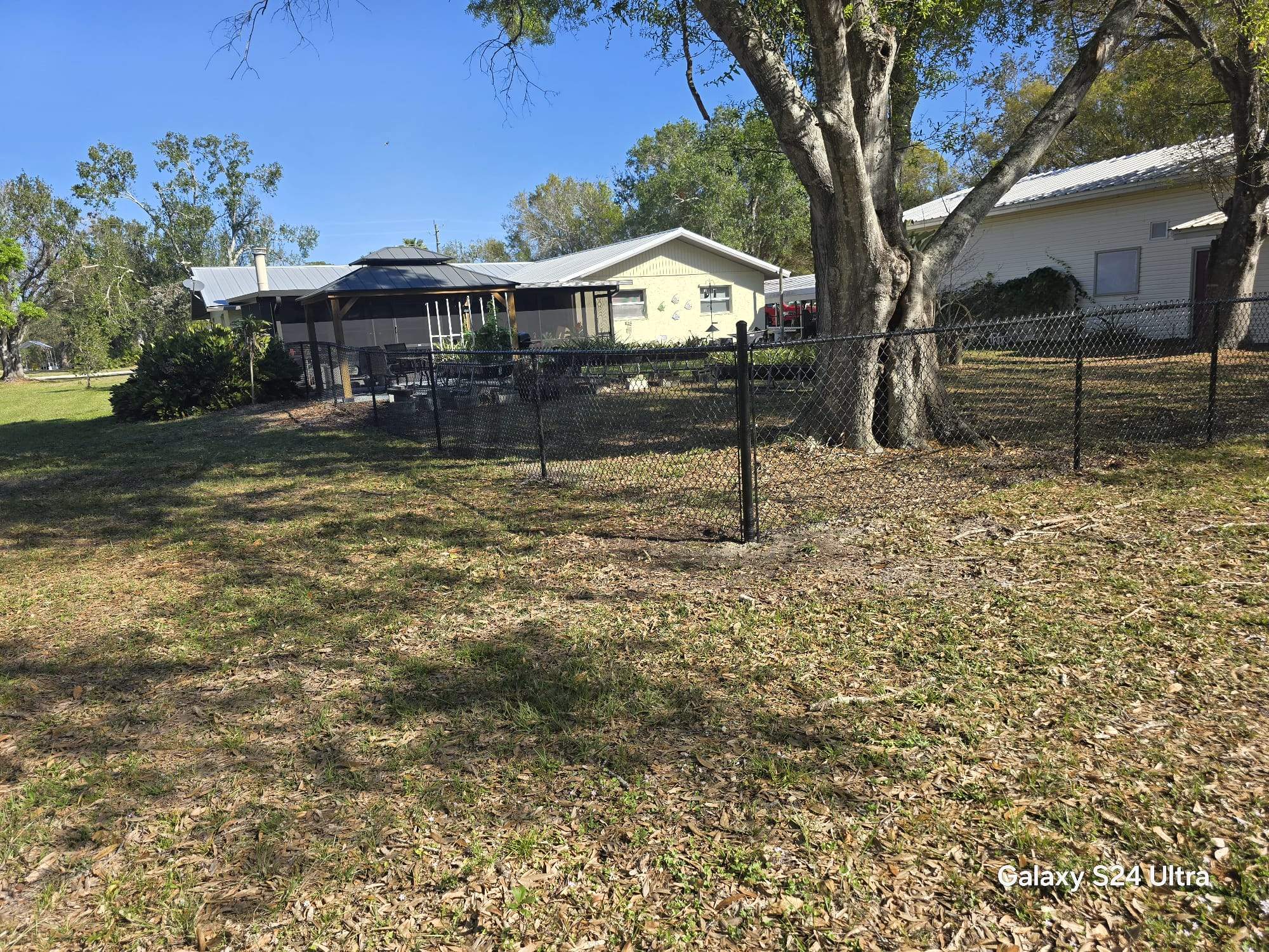 Black Chain Link Fence Installation in Port Charlotte by True Fence LLC