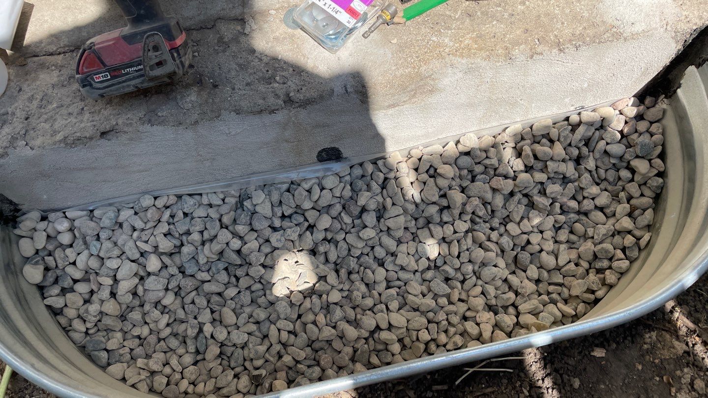 Drain Tile, Window Wells & Buried Discharge in Minneapolis by Waterproofing Northeast