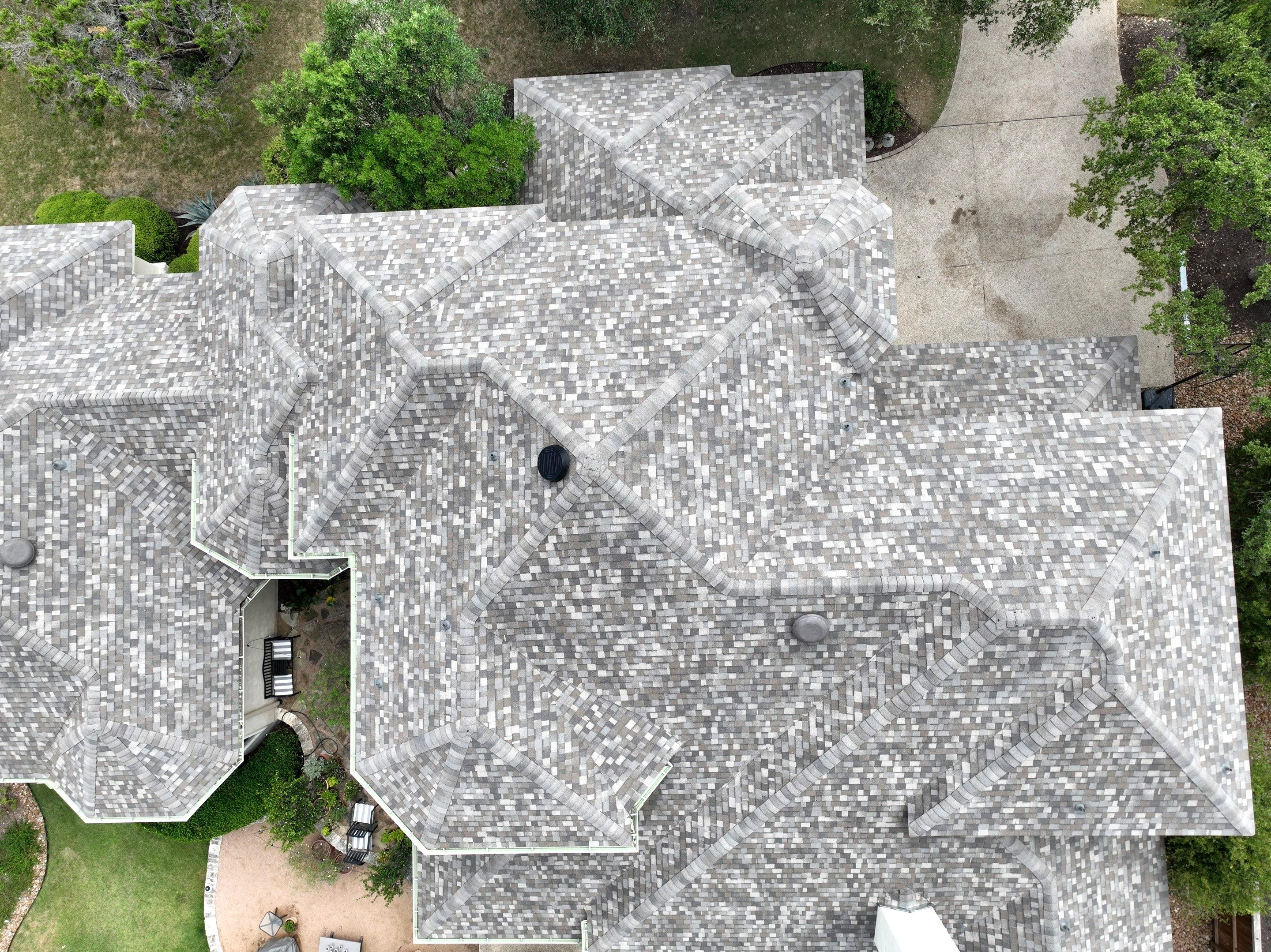 Residential Roof Replacement using 30 Year Laminate Shingles with High Profile Ridge by Premier Roofing and Contracting