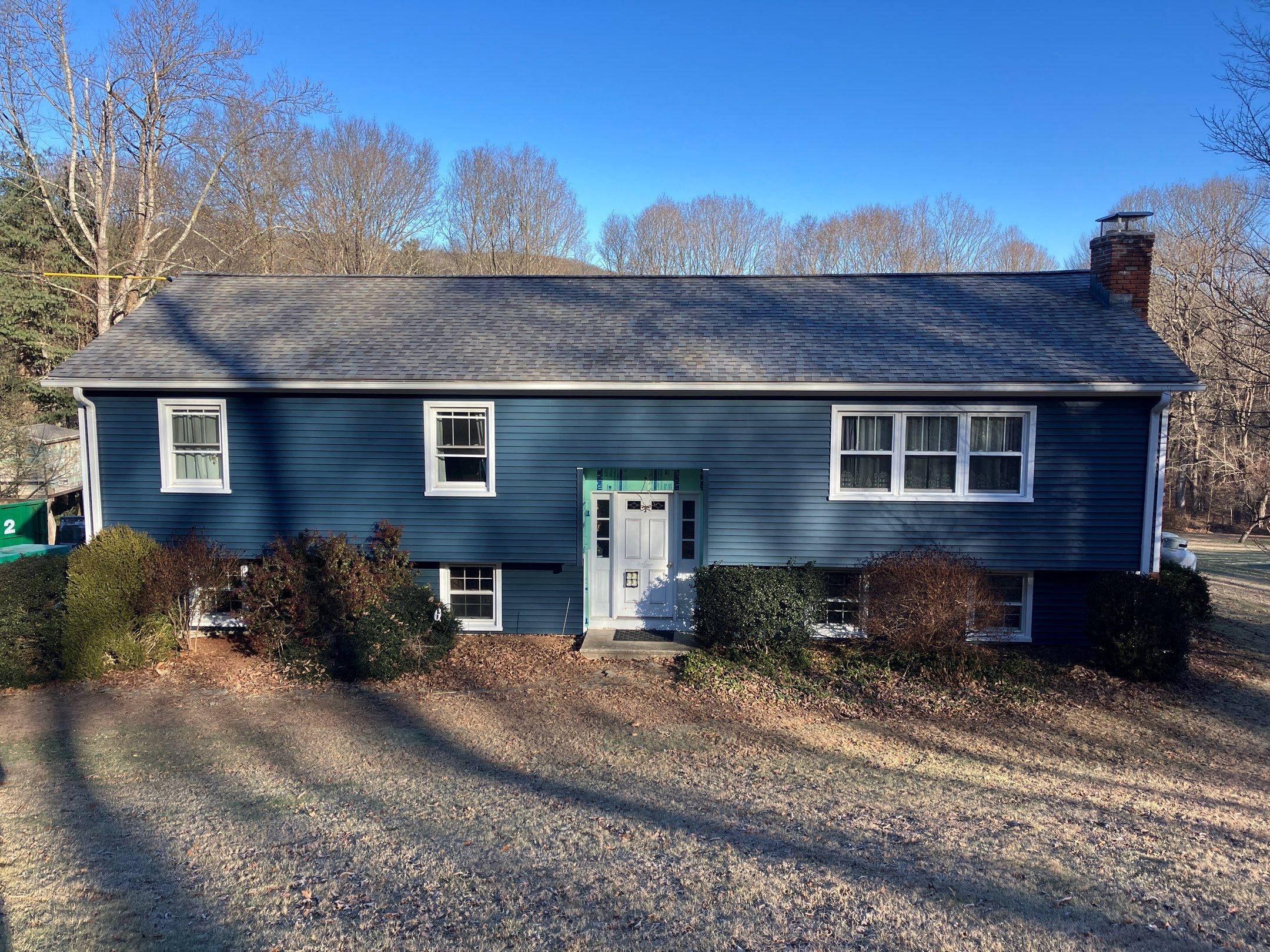 Striking siding update with Cert. Monogram D/4 x 12'6" clapboard, Deep Mineral by DiGiorgi Roofing and Siding Inc