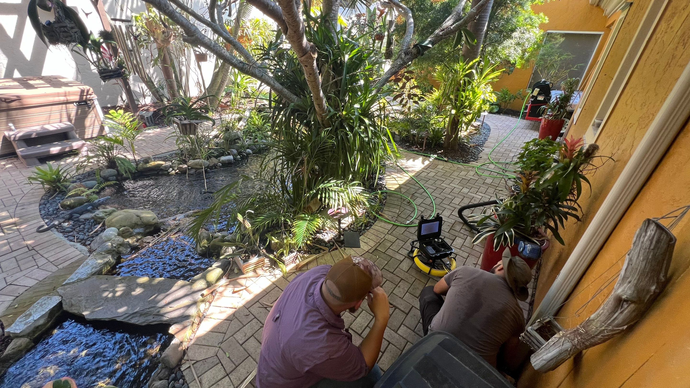 Residential Stormwater Gutter Drain System Maintenance by APS Power & Water