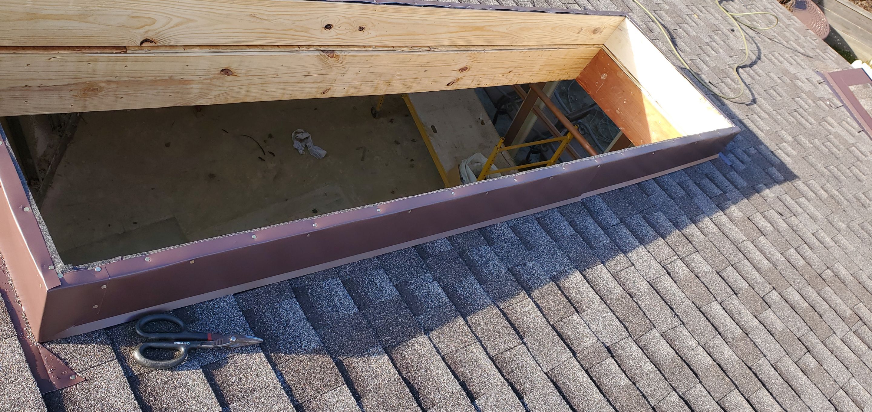 Skylight removal and install  by Absolute Roofing and Construction