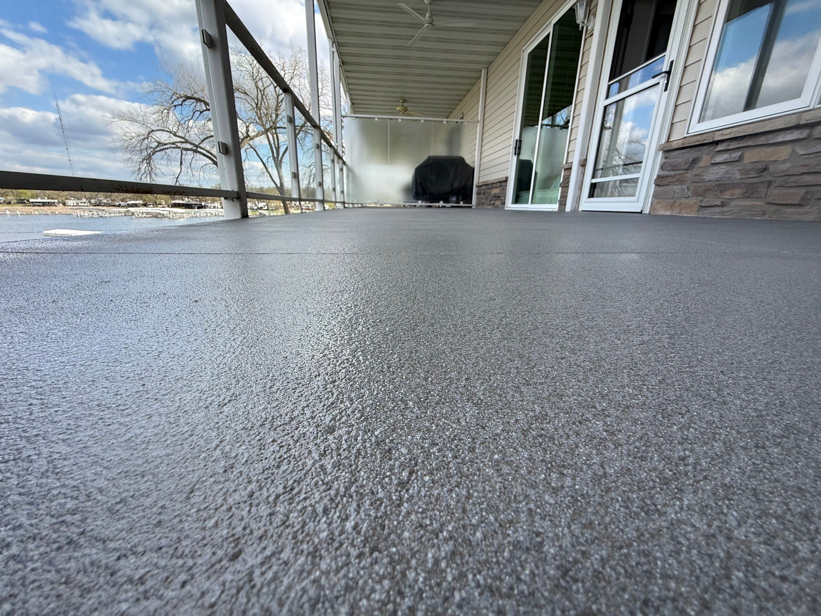 Dark Gray Slip-Resistant Concrete Coating for Arnolds Park Balcony by Select Painting, Coatings & Garage Cabinets