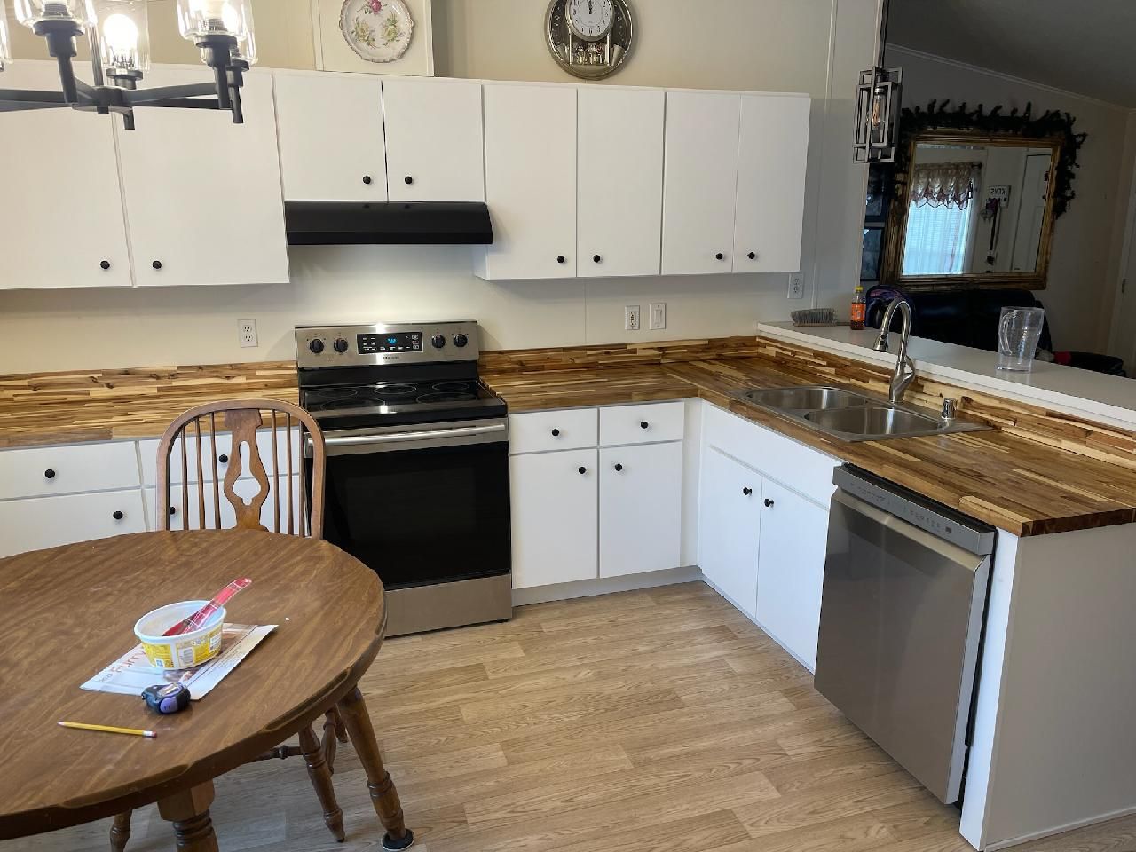 Complete kitchen remodel, Cabinets, New sink, New Flooring, Paint by Painter1 Inland Northwest