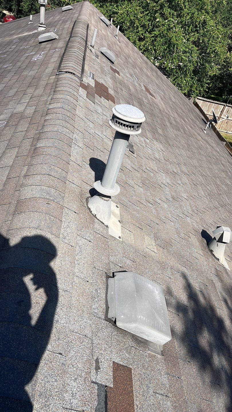 AMIG approved this roof for wind damage, fascia painting, and window work. by Roof Repair Company