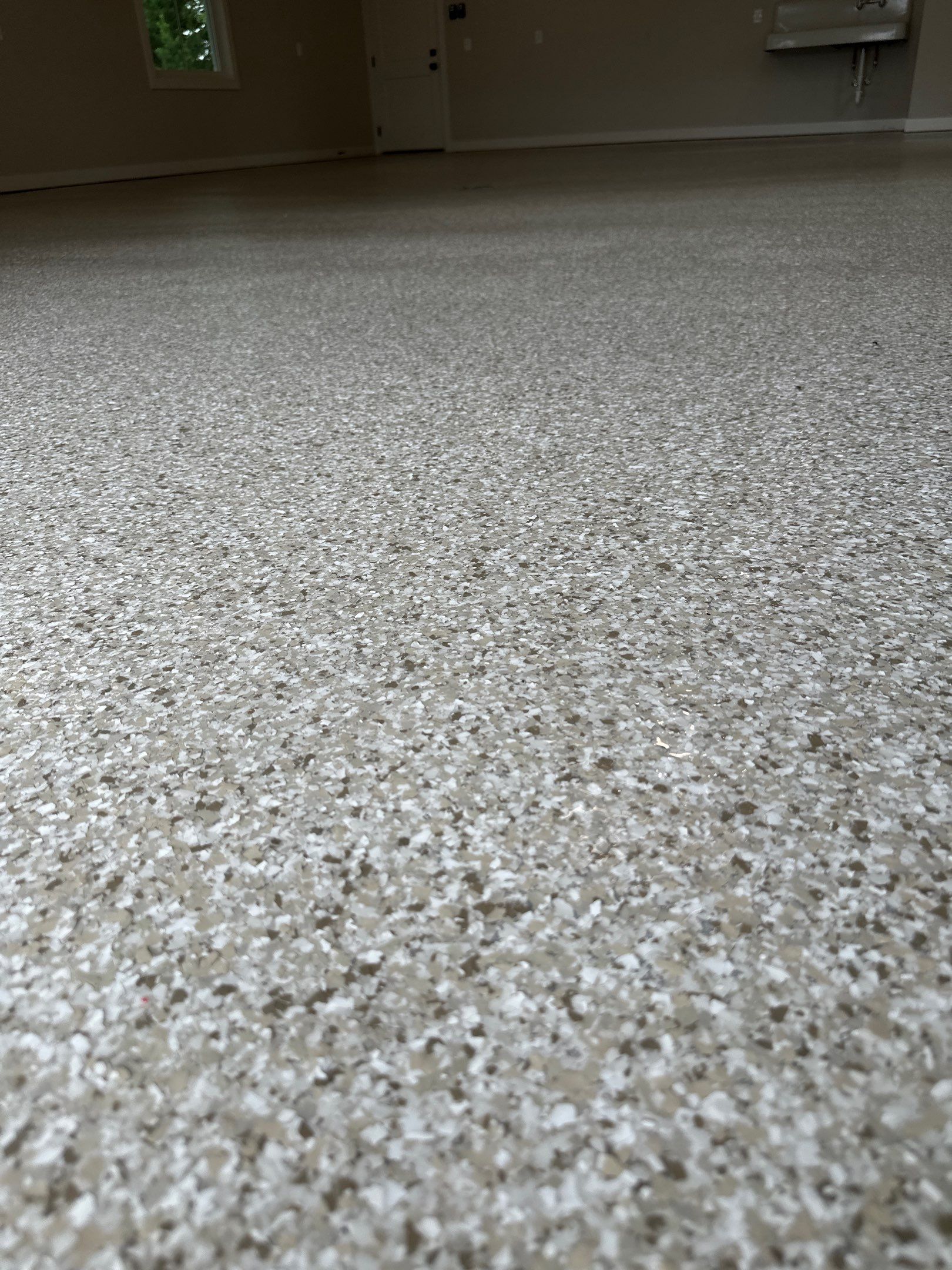 Trail Mix Epoxy Garage / Even Space by Goat Coatings