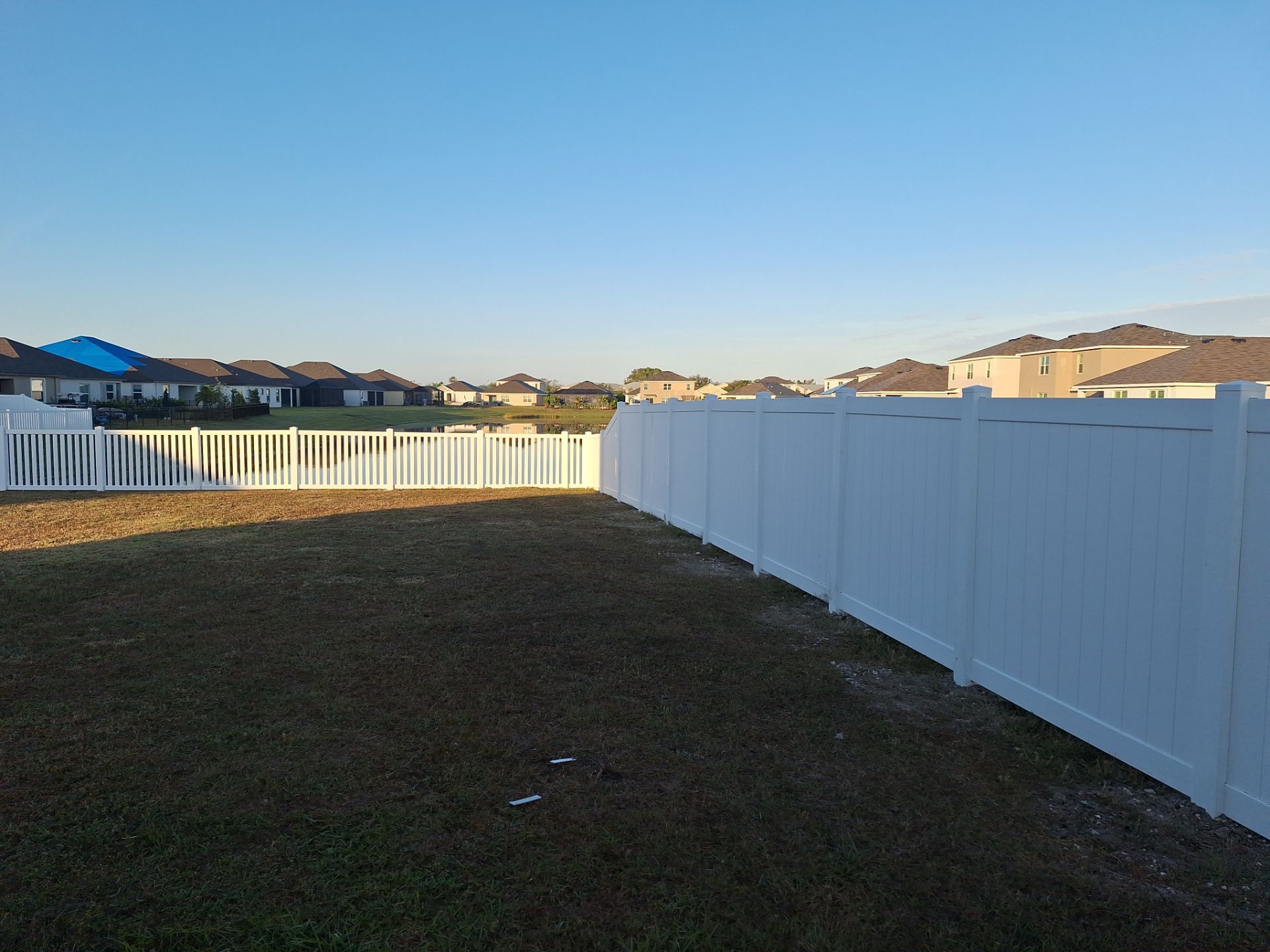 Vinyl Fence Installation using 6Ft White Vinyl Privacy Fence with a 4Ft White Clearwater Picket Fence by Asap fence and gates, LLC