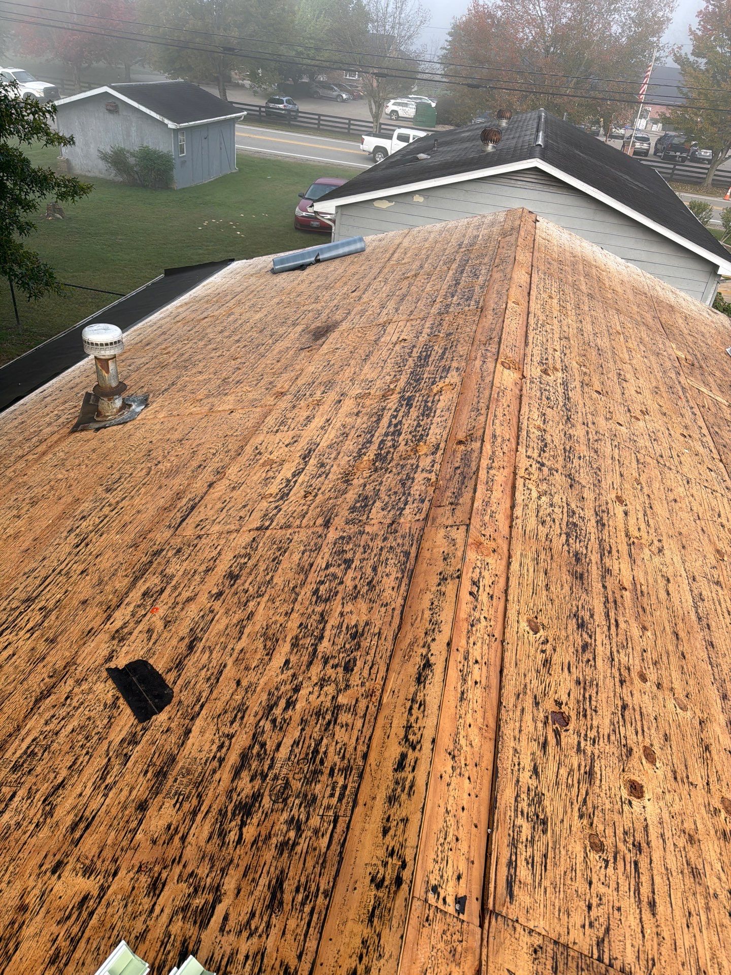 Residential Roofing Installation using GAF Timberline HDZ Charcoal by Rainstoppers Roofing