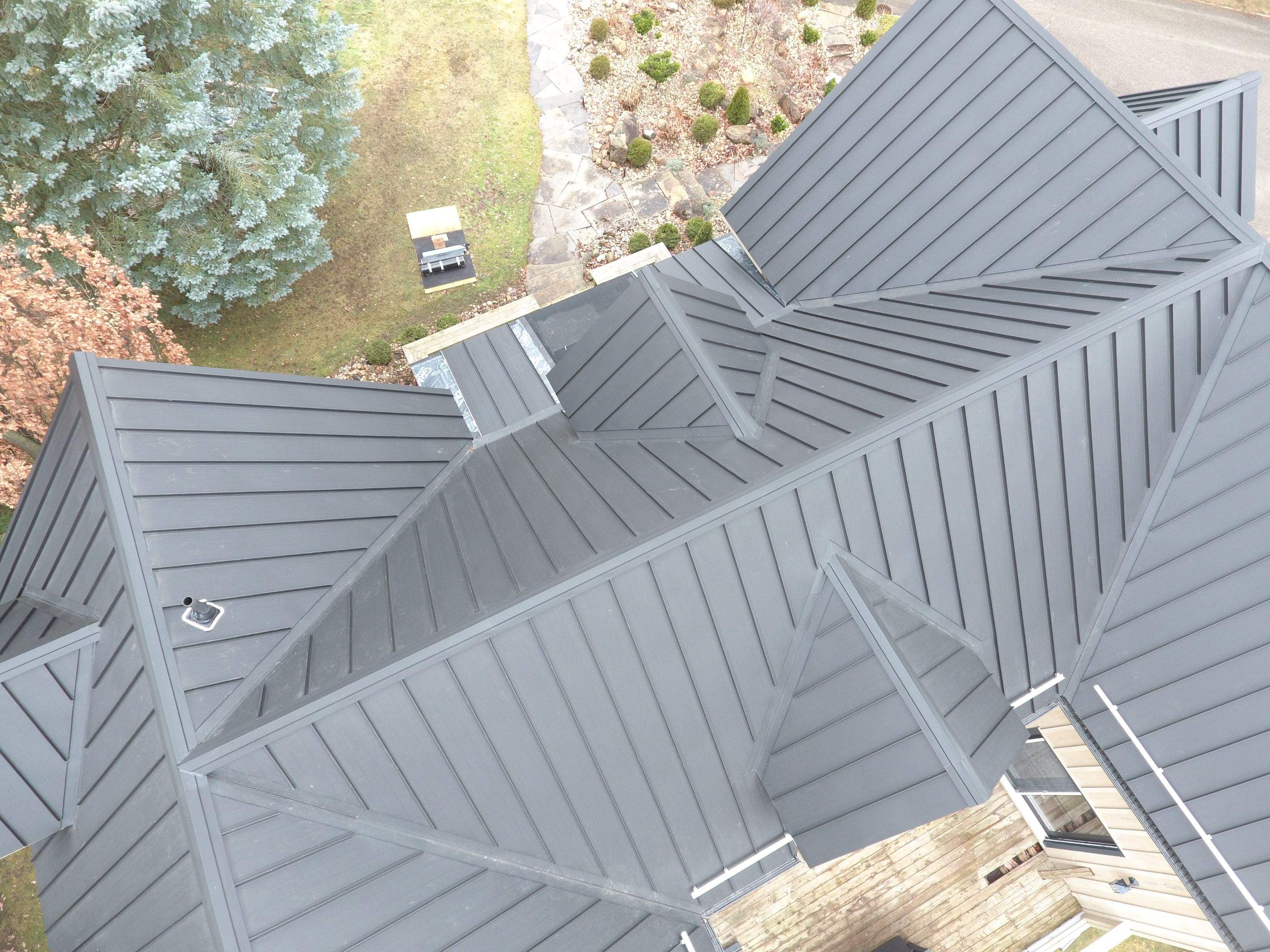 Residential Roofing Installation using 24 Ga Standing Seam Metal by Jay Carter Roofing & Sheet Metal