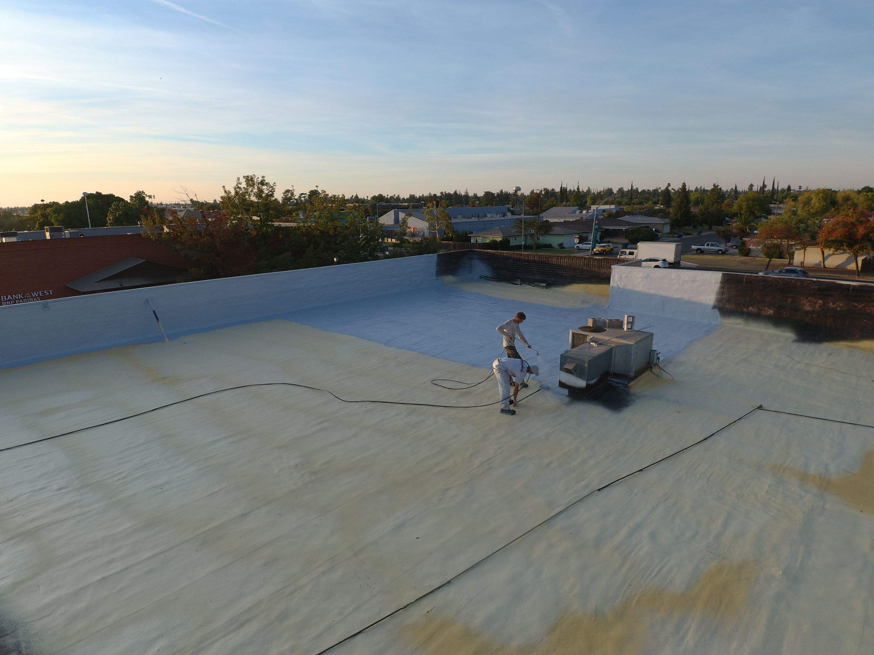 Reburbish existing spray foam job by Straight Edge Roofing Inc