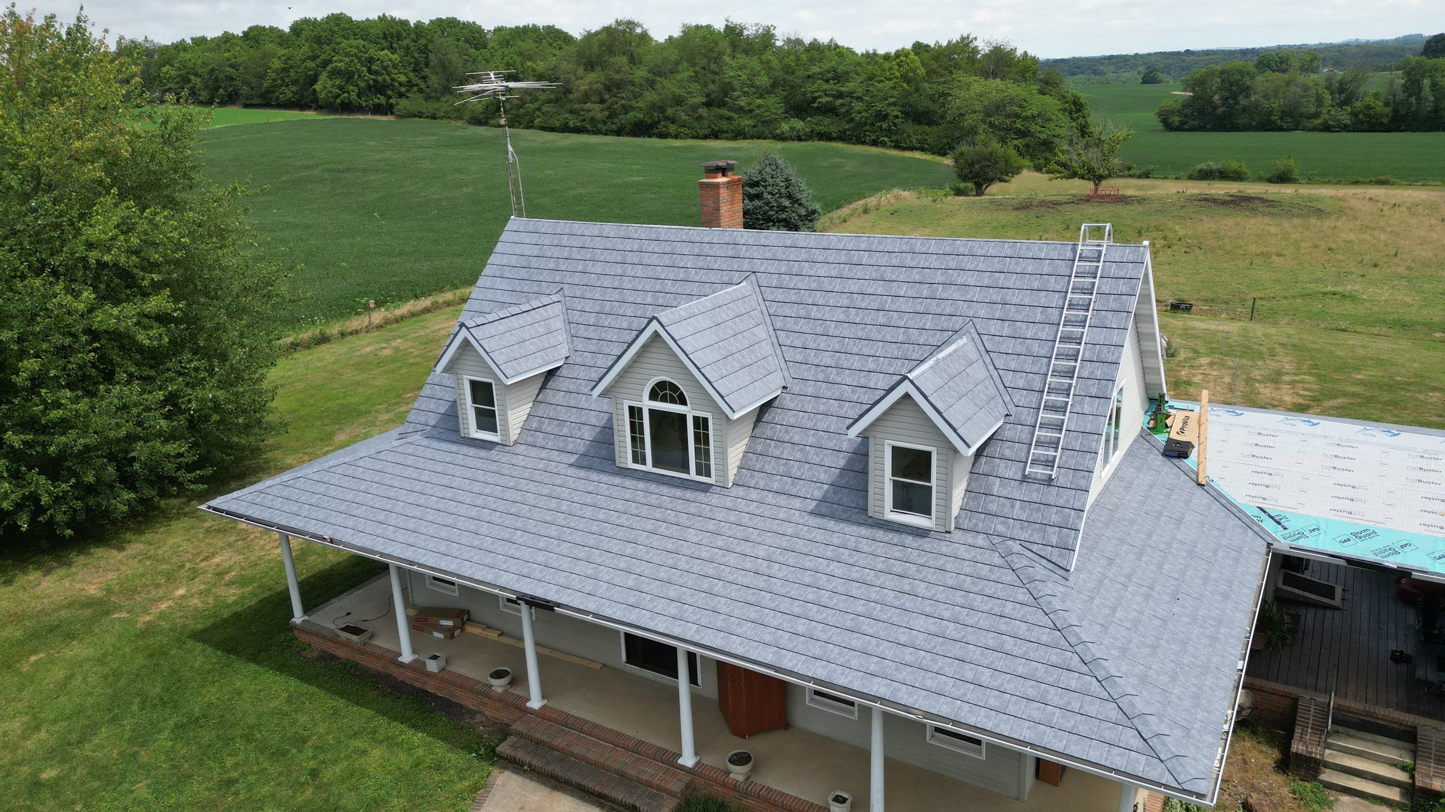 Residential Roofing Installation using ProVia Ironstone Slate Metal Roofing by RoofX 