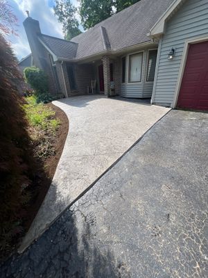 Heavy stone textured stamped concrete patio 