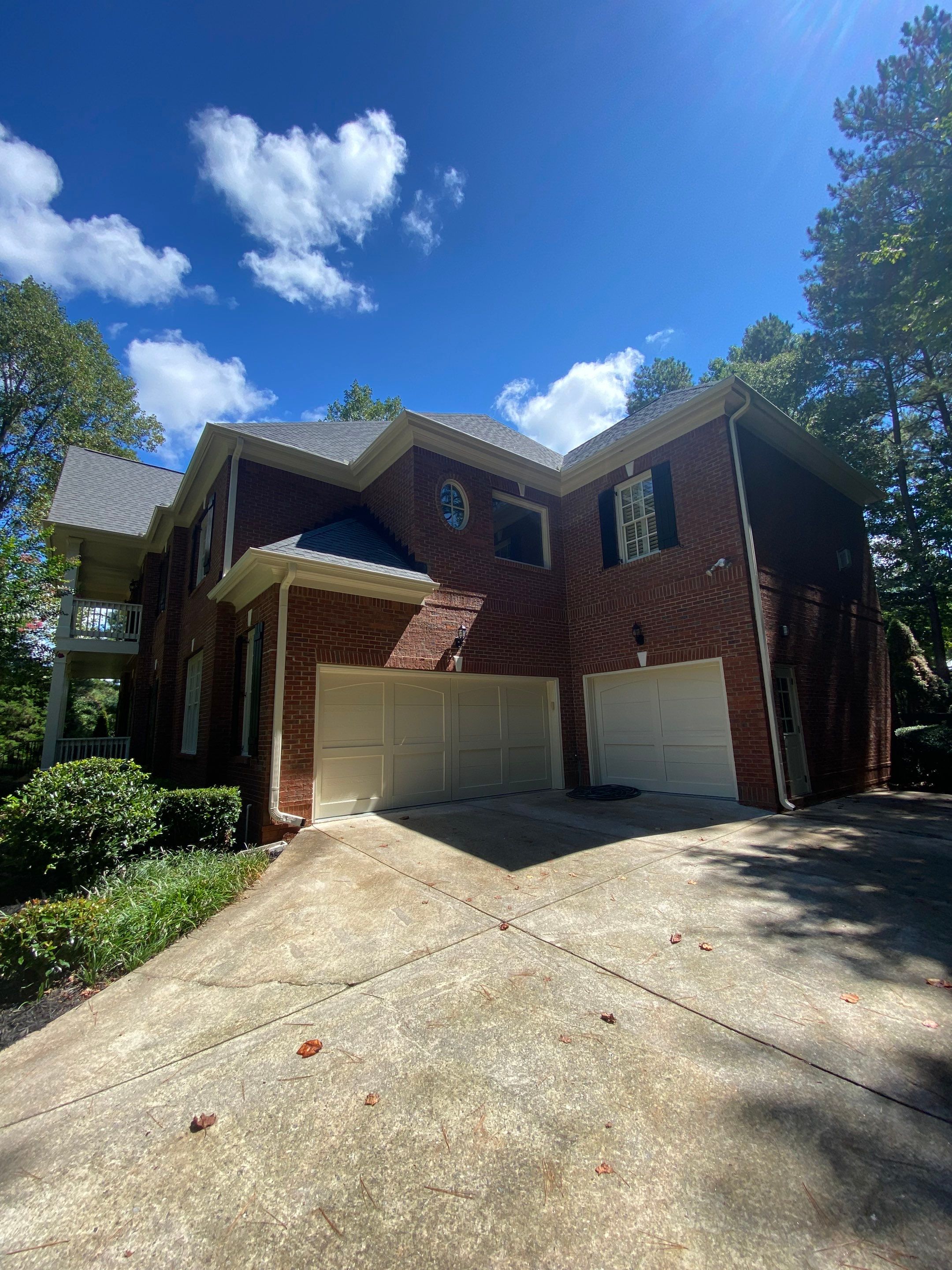Exterior Trim and Garage Door Painting for Alpharetta Brick Home by Swift Home Renovations