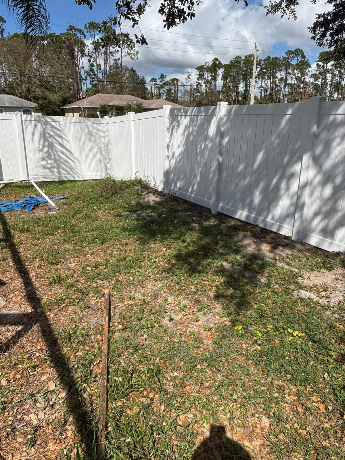 White Vinyl Privacy Fence and Gate Installation in North Port by True Fence LLC