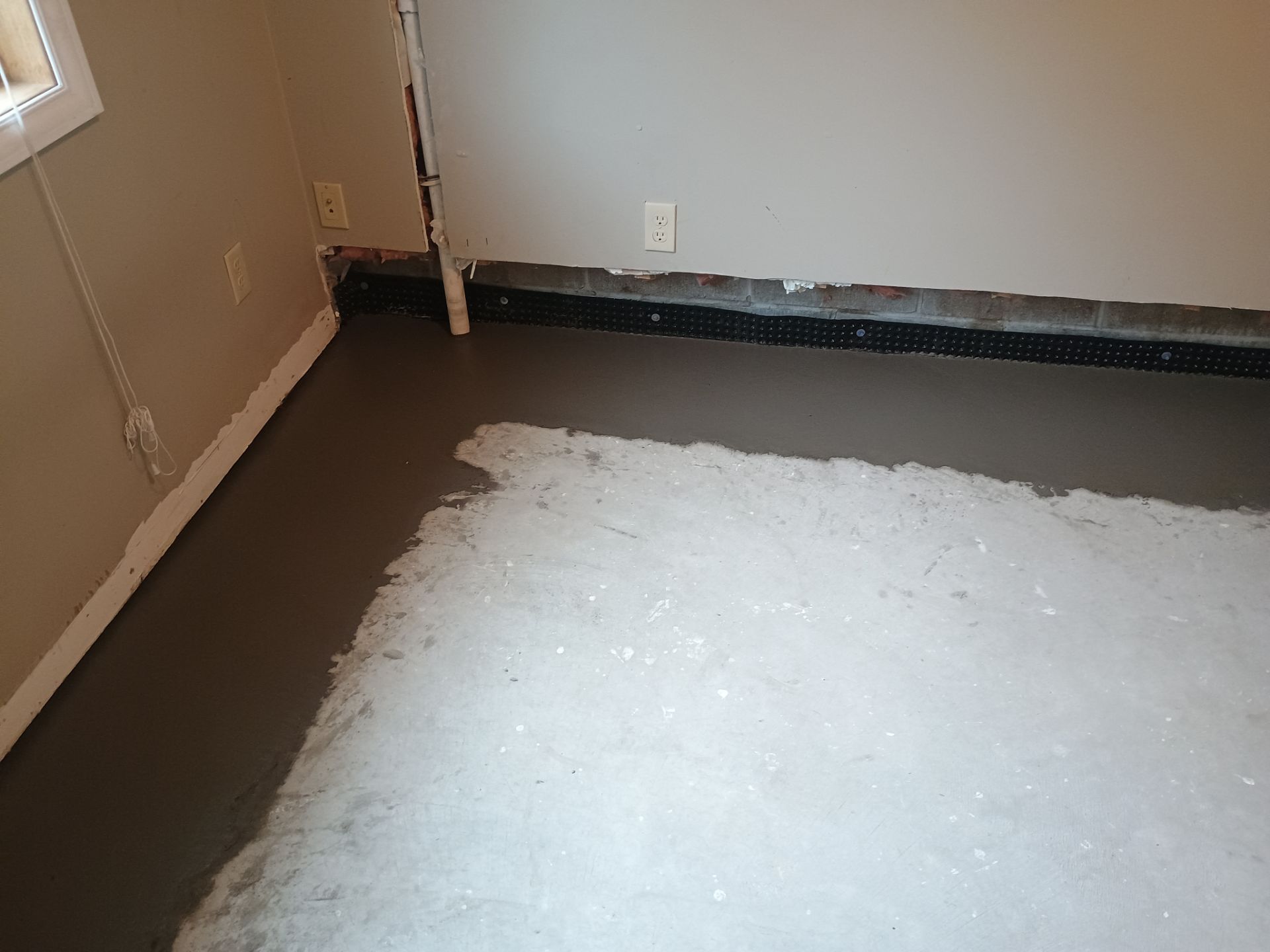 Interior Drain Tile & Sump Pump Installation in Delano, MN by Waterproofing Northeast