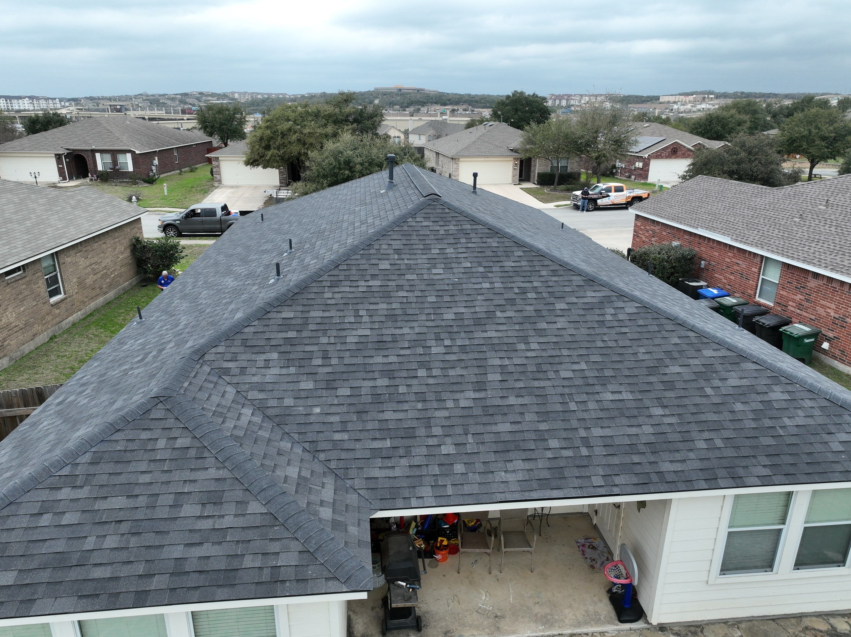 Residential Roof Replacement using 30 Year Laminate Shingles with High Profile Ridge by Premier Roofing and Contracting