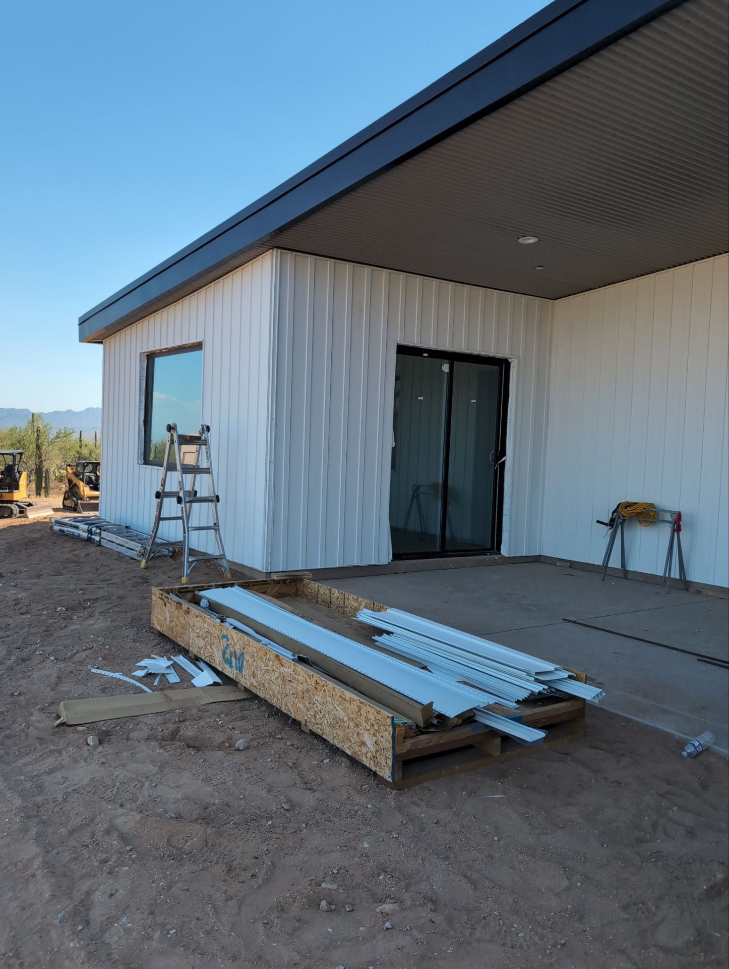 Polar White Metal Siding by Reimagine Roofing